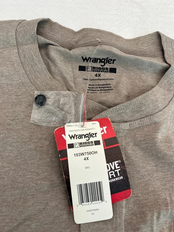 Grey long sleeve Wrangler work shirt. Front pocket with utility hook. Brand new