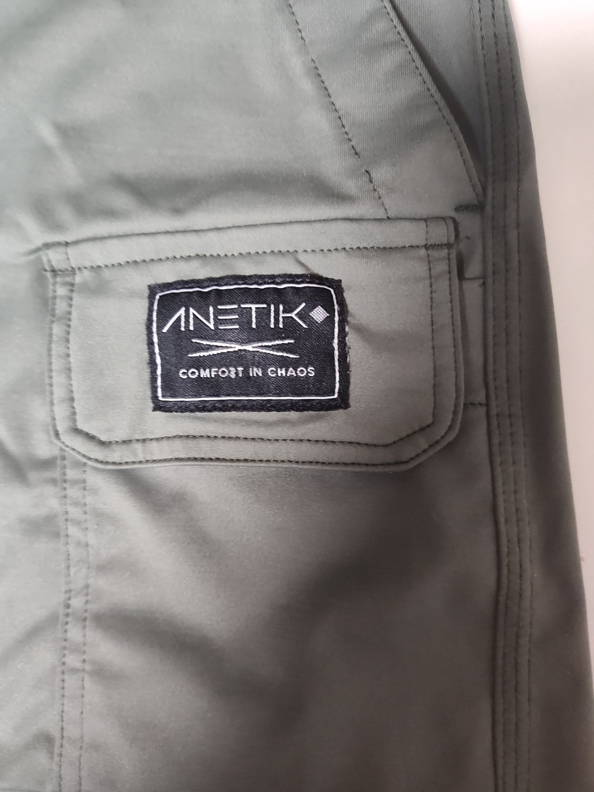 Anetik Men’s Roam Tech Shorts in a dark olive color Size Small