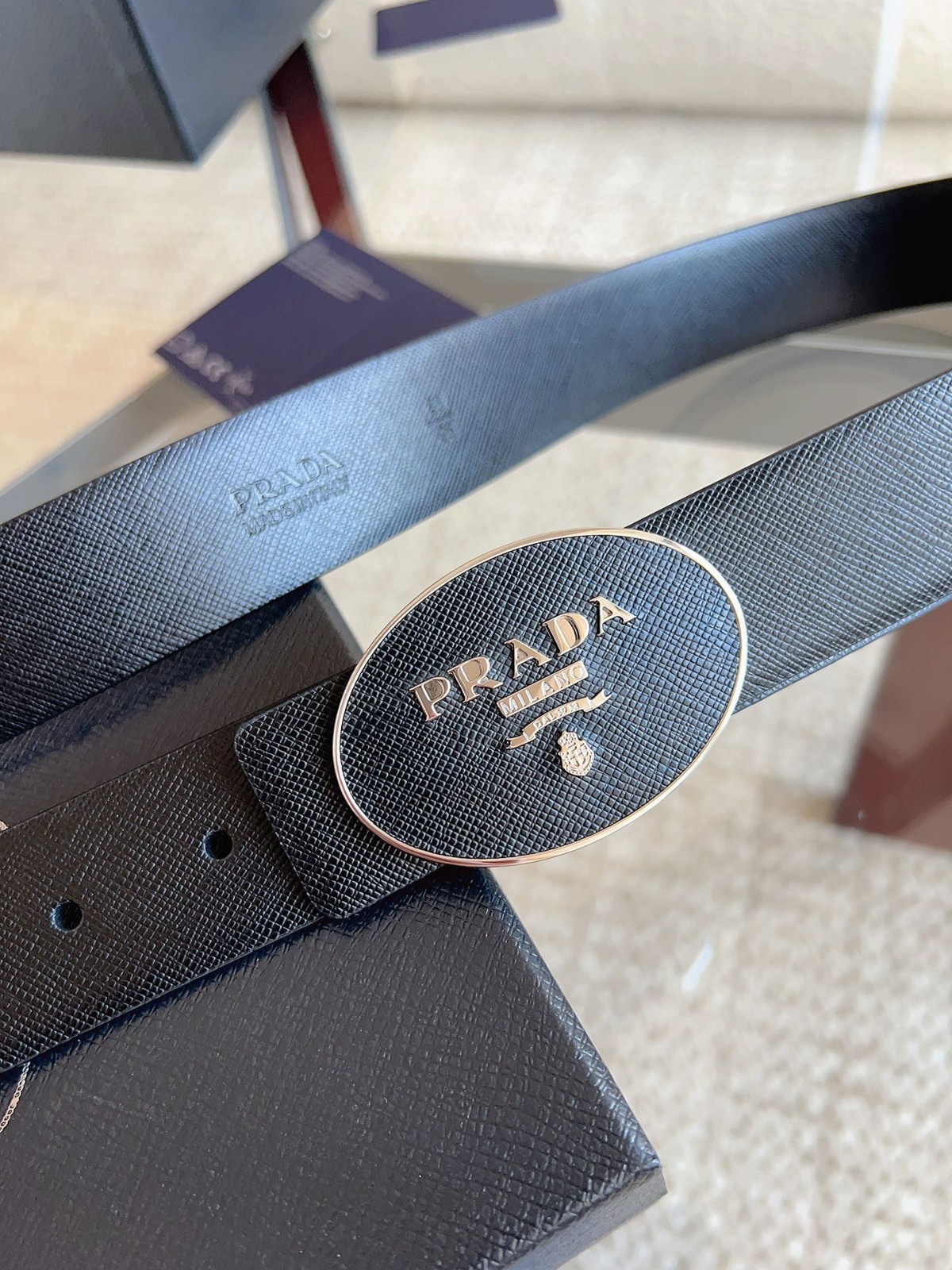 Prada men’s black-button black leather belt