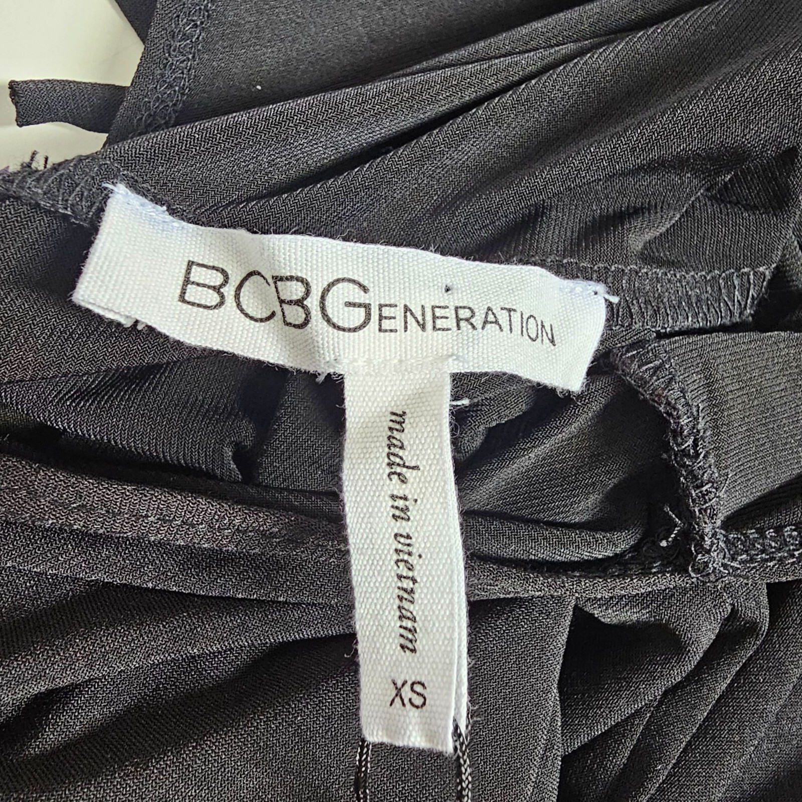 BCBGeneration Black Sleeveless Jumpsuit XS Polyester Spandex Blend MSRP $88