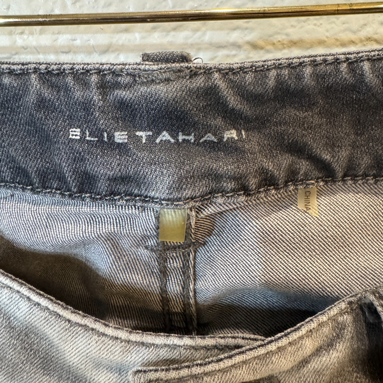 Elie Tahari “Azella” Skinny Jeans in a faded grey wash