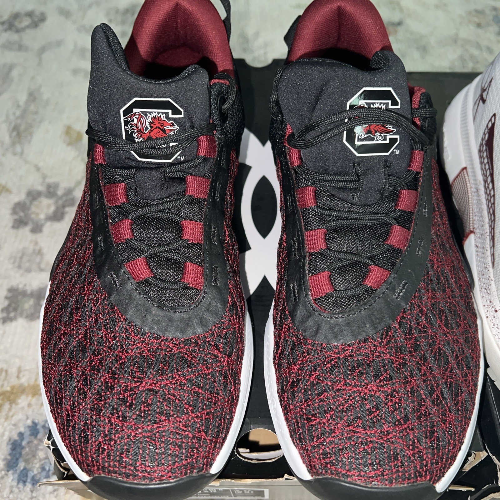 Under Armour UA Spawn 5 South Carolina Gamecocks Shoes both pairs in excellent