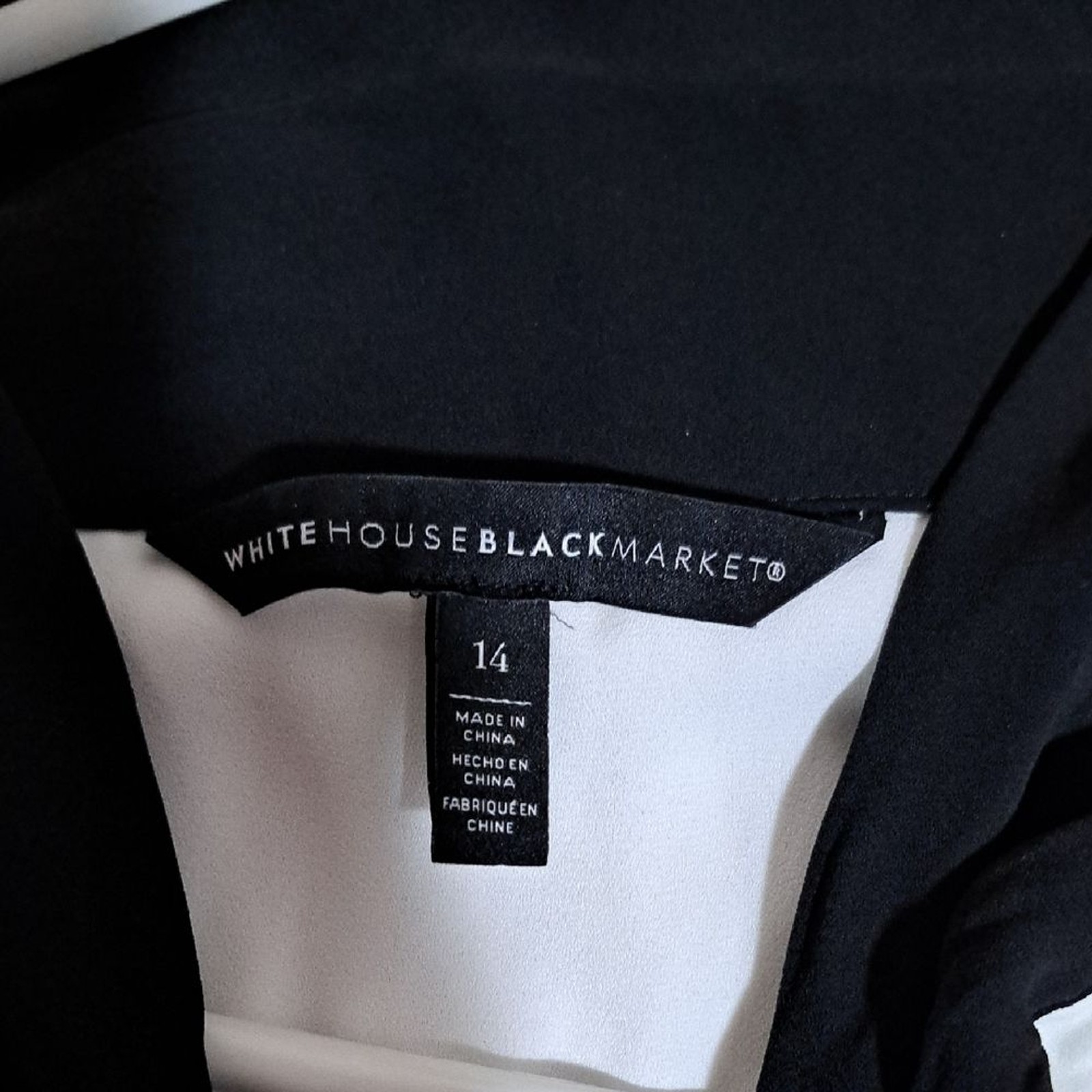 Black and White Sleeveless Blouse