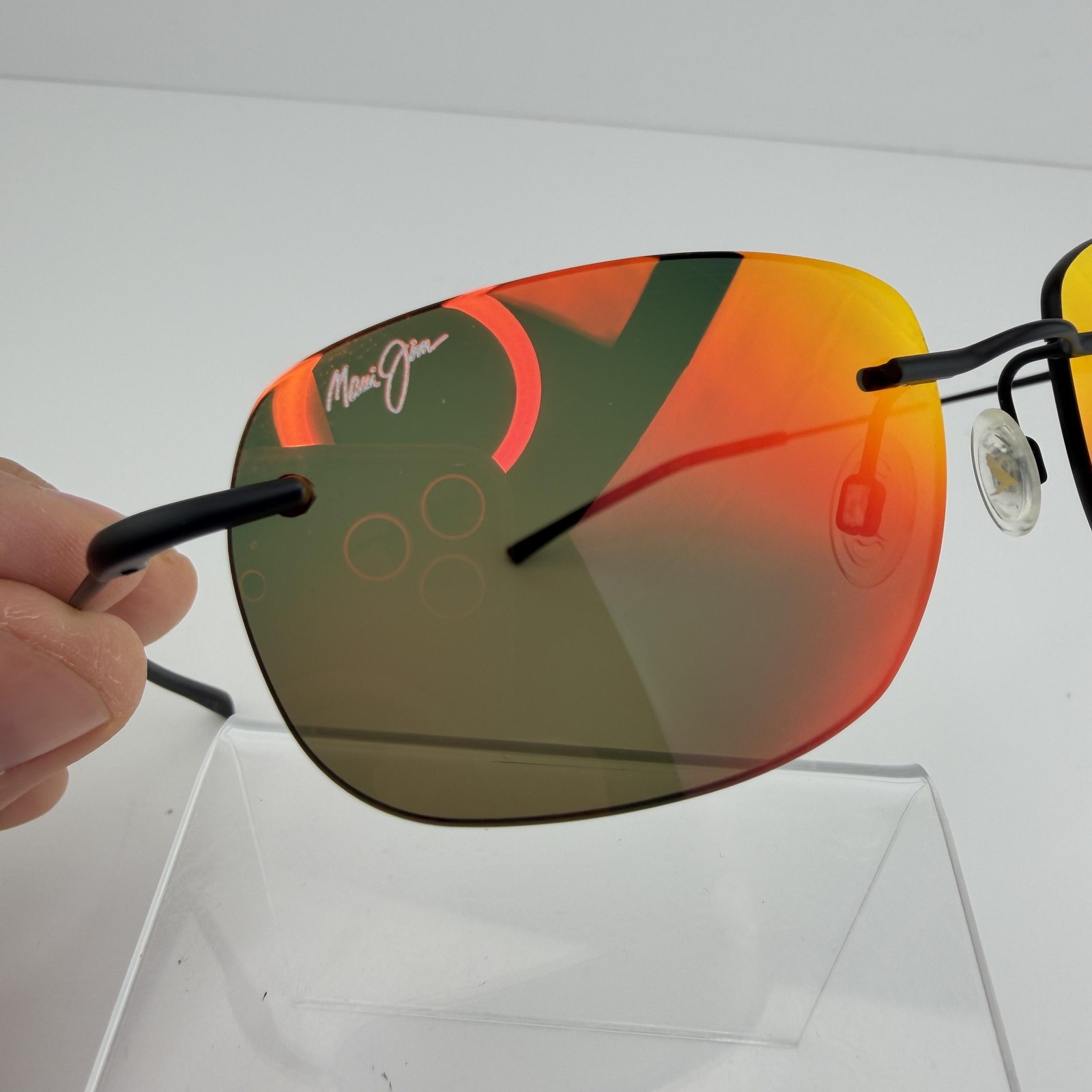 Maui Jim Sunglasses Nanea MJ332-2M Mens Black Rimless Orange Mirrored Polarized