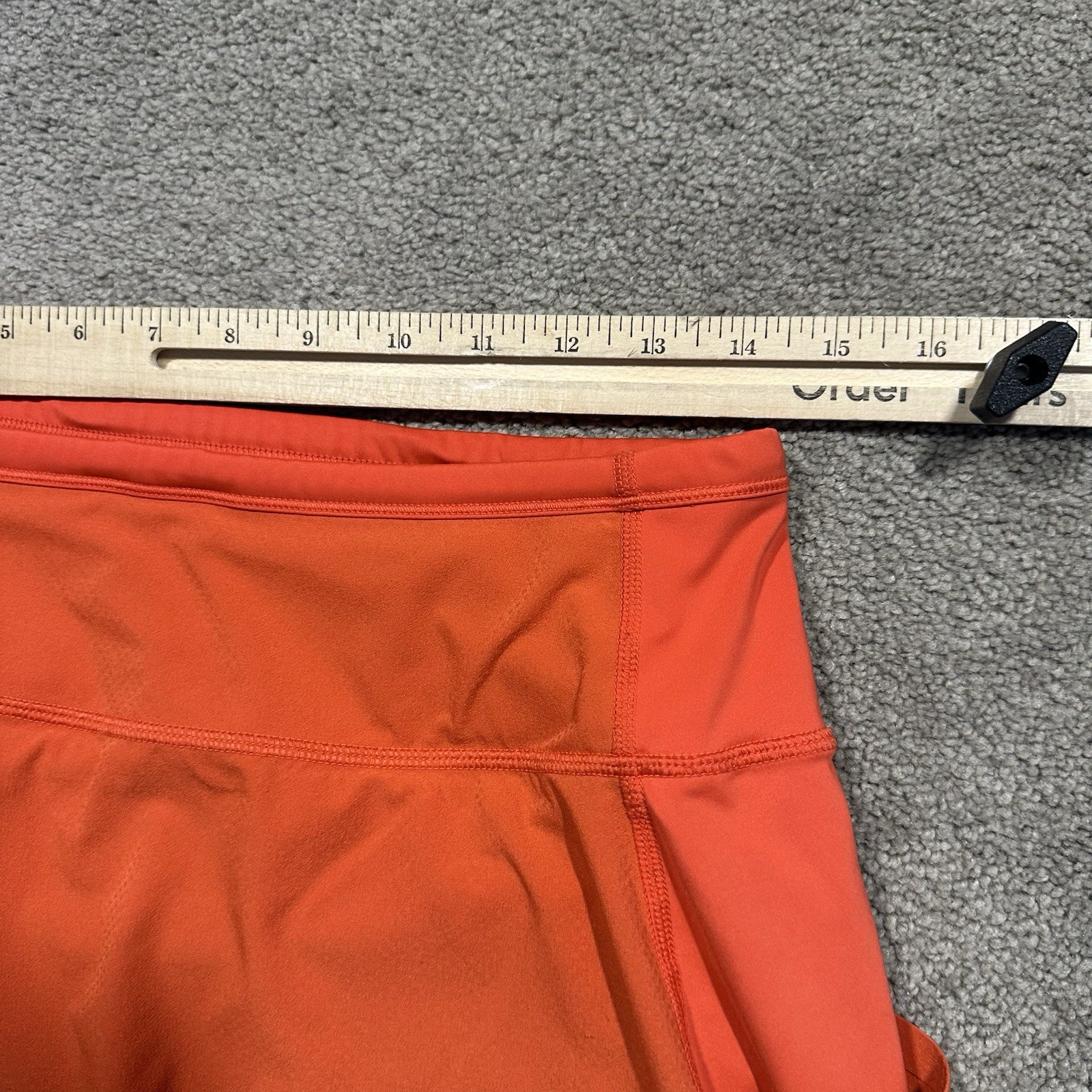 ATHLETA Action Skort in Dobby 14.5 Womens Small Orange Pockets Stretch Athletic