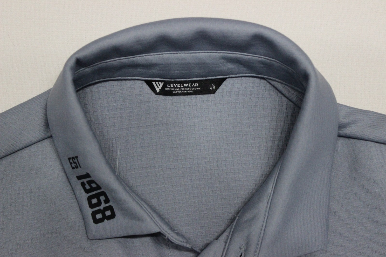Levelwear Primary Polo Shirt Men’s Size L Pebble Gray Short Sleeve Logo Golf NWT