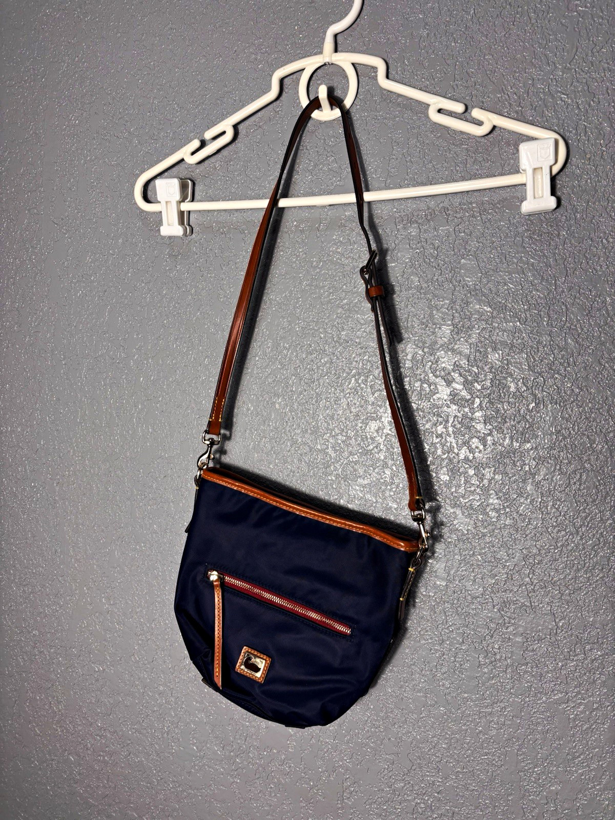 Dooney & Bourke Navy Crossbody Bag Zip Top Brown Leather Strap Gold Hardware