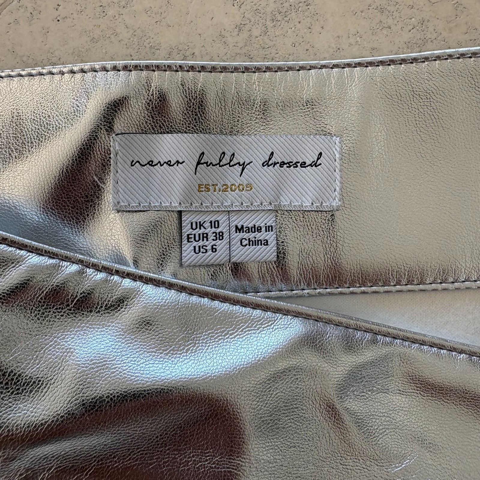 NEVER FULLY DRESSED Silver Faux Leather Mini Jaspre Skirt Metallic – Size 6