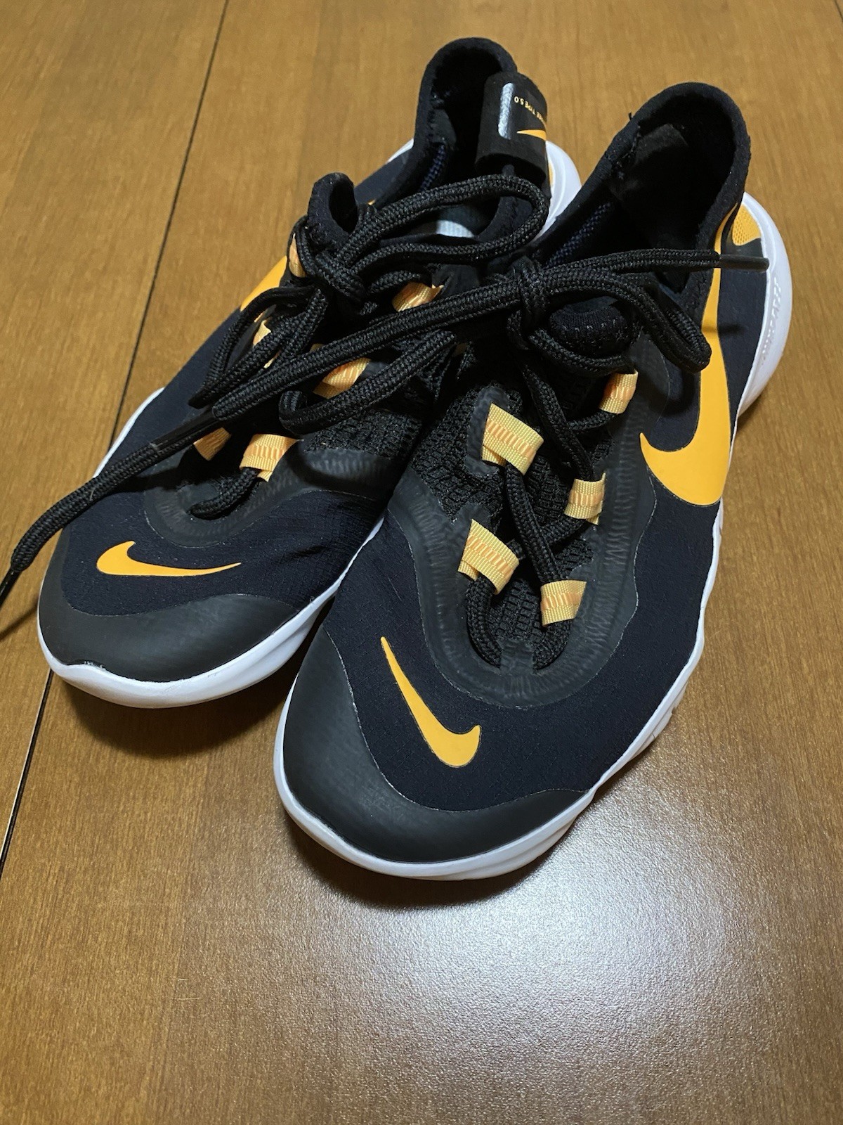 Nike Free RN CT6718-991 Women’s Black Orange White Low Top Athletic Sneaker