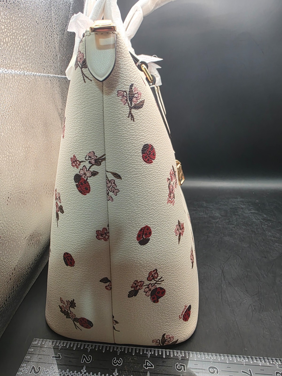 NEW COACH GALLERY TOTE WITH LADYBUG FLORAL PRINT (SCUFF MARKS BACK)