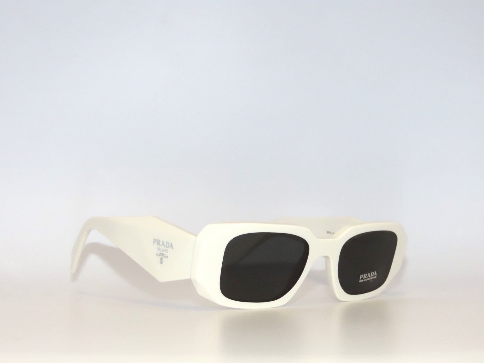 Prada SPR17WS 17 1425S0 Talc Dark Gray Sunglasses 17W