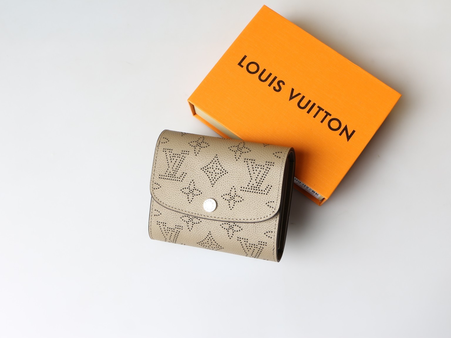 LOUIS Beige Mahina Perforated Leather Iris Compact Wallet