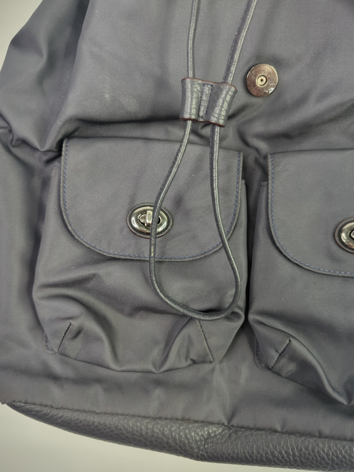 Coach Billie Navy Nylon & Pebbled Leather Turn Lock Drawstring Backpack