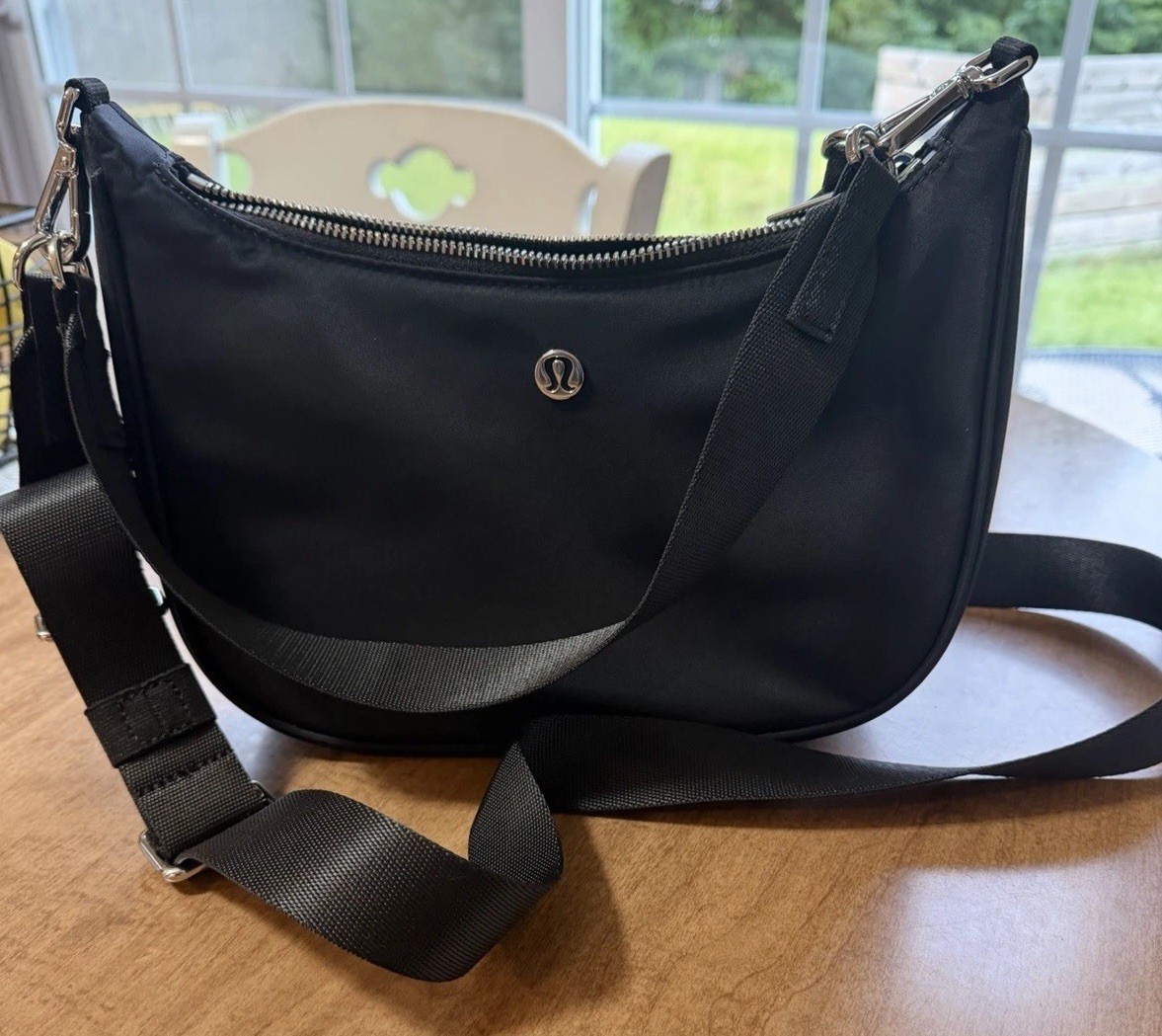 Lululemon City Essentials Black crossbody with silver hardware