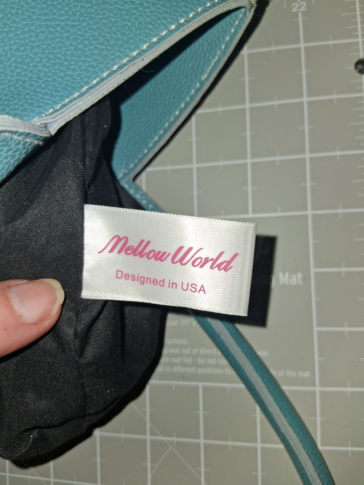 Mellow World tote grained vegan leather tulip curved front panel vibrant teal