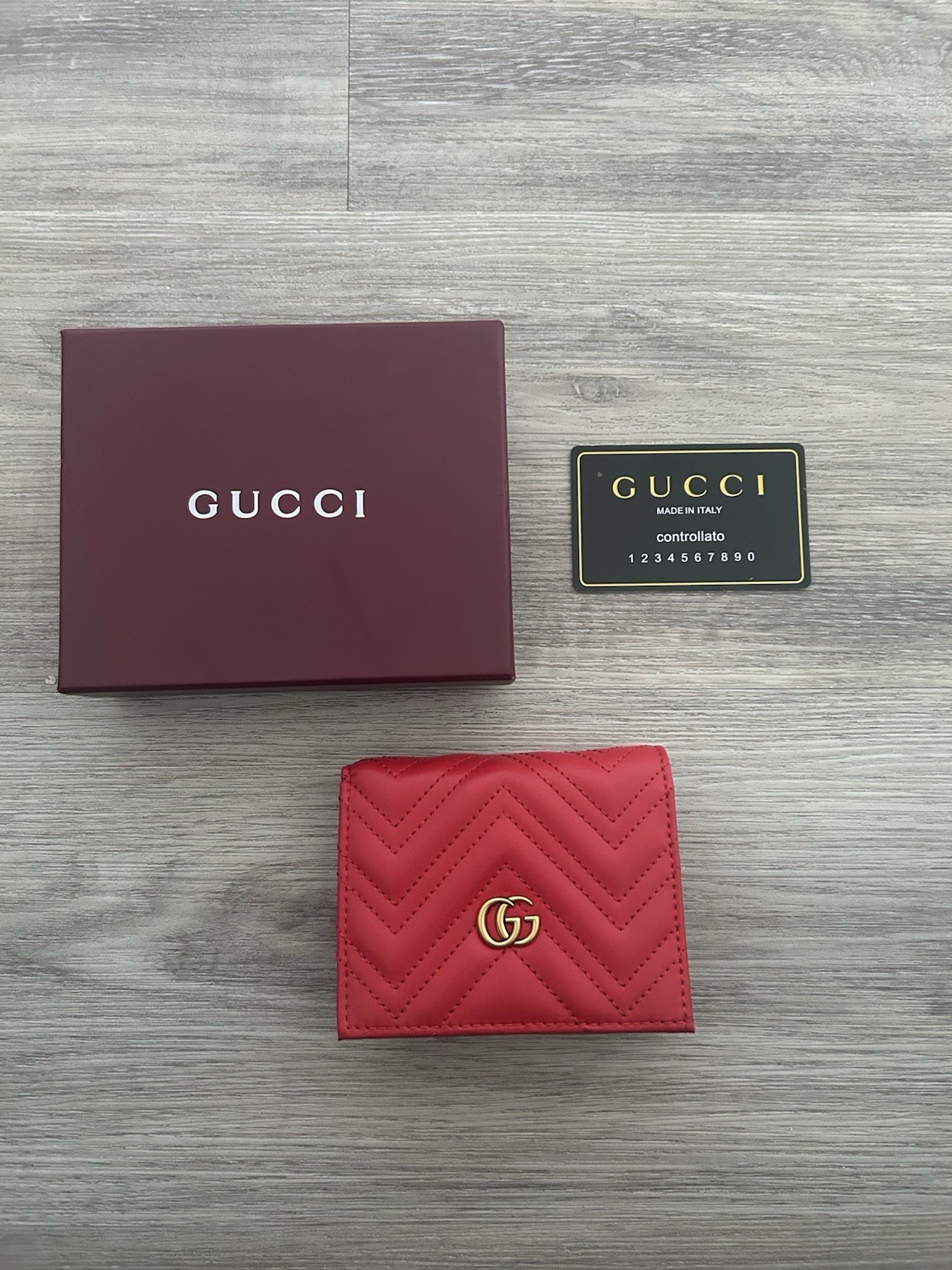 Gucci GG Marmont card case wallet in Red quilted chevron leather.