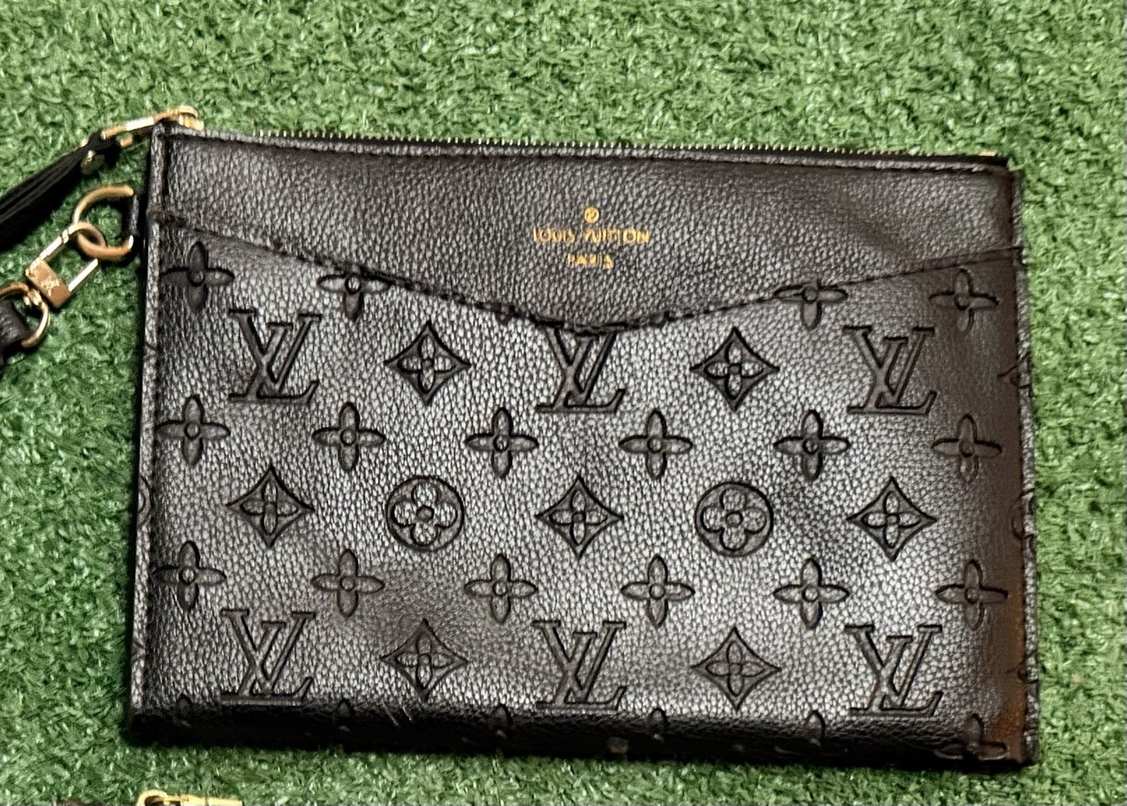 Louis Vuitton Daily Pouch in Monogram Empreinte Leather (Black/Noir).