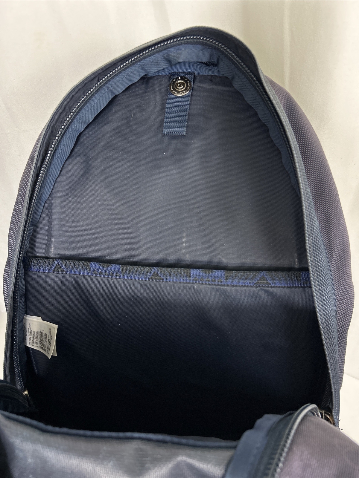 The North Face Lineage 20L backpack book bag navy used Flaw Small Rip On Side