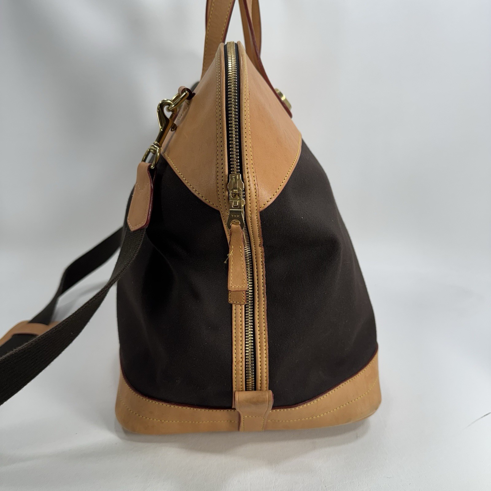 Dooney & Bourke Tan and Black Cabriolet Overnight Travel Bag – See Details