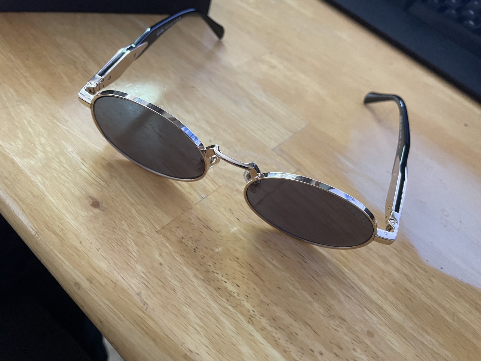 PRADA PR 65ZS ZVN09T Pale Gold Dark Grey 55 mm Women’s Sunglasses