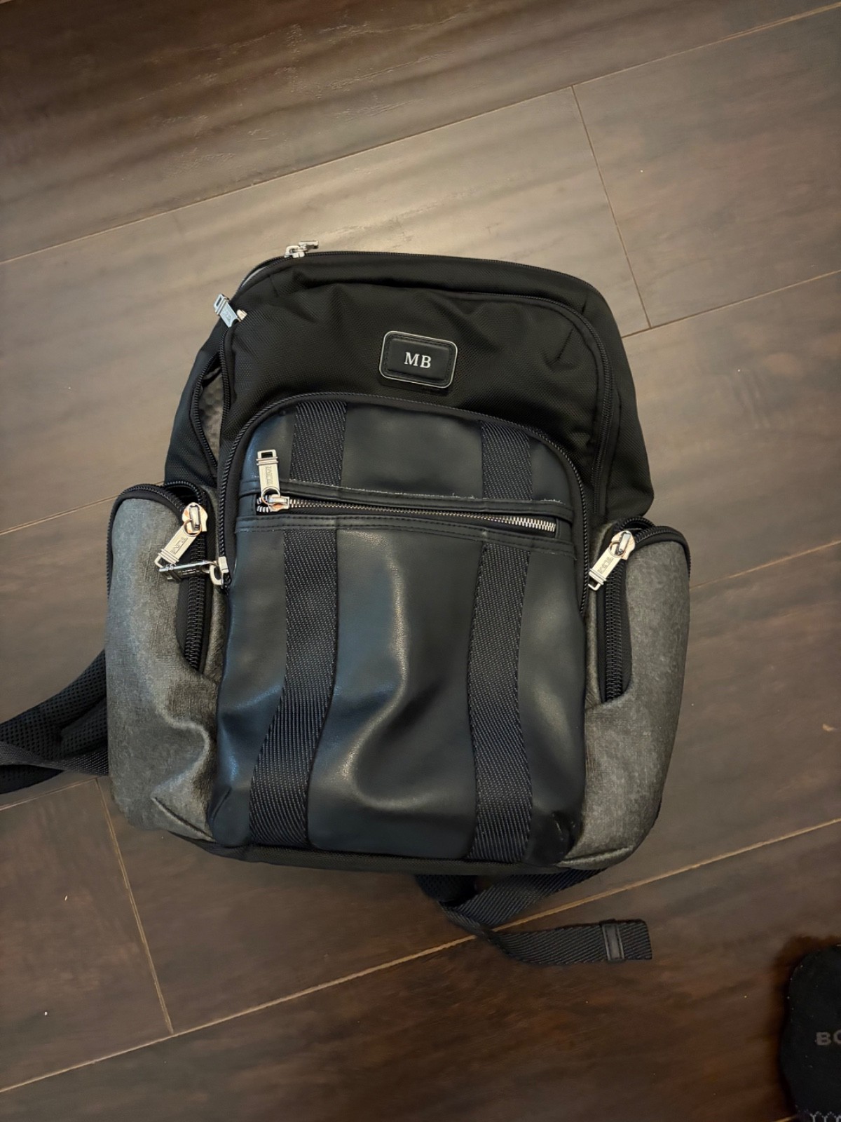 tumi backpack men leather
