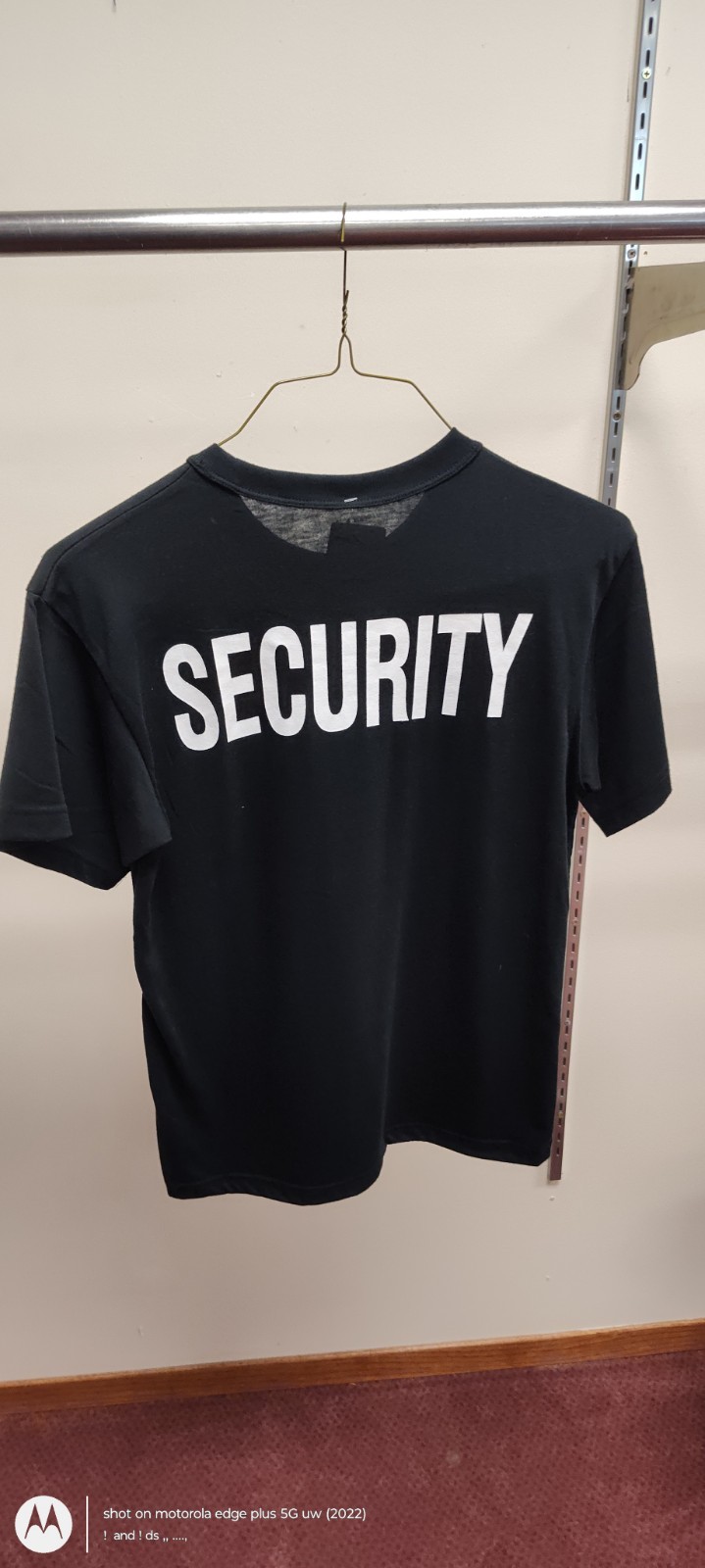 Security black T-shirt with Security printed on it