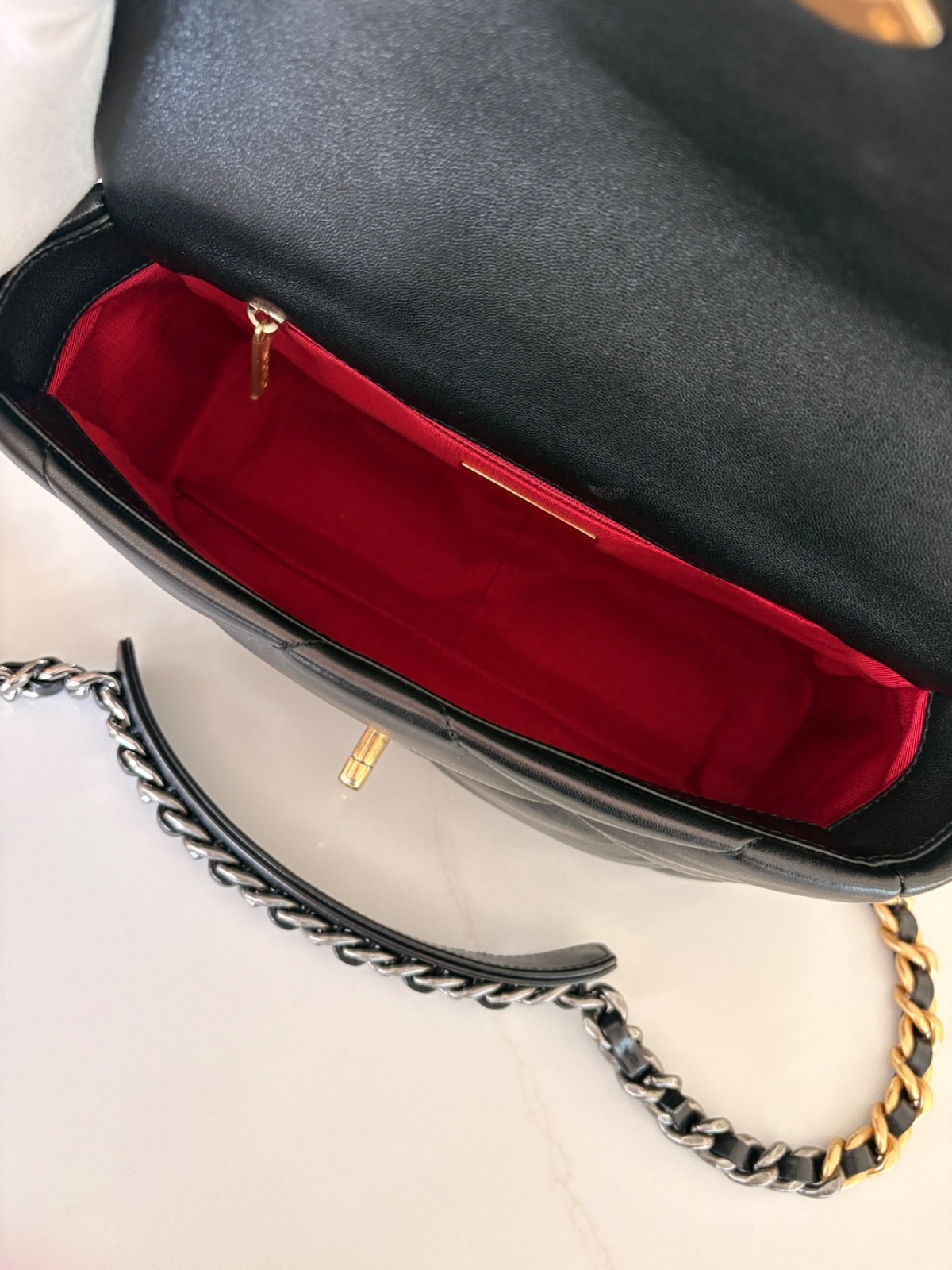 Authentic Chanel 19 in black Lambskin with mixed hardware size small