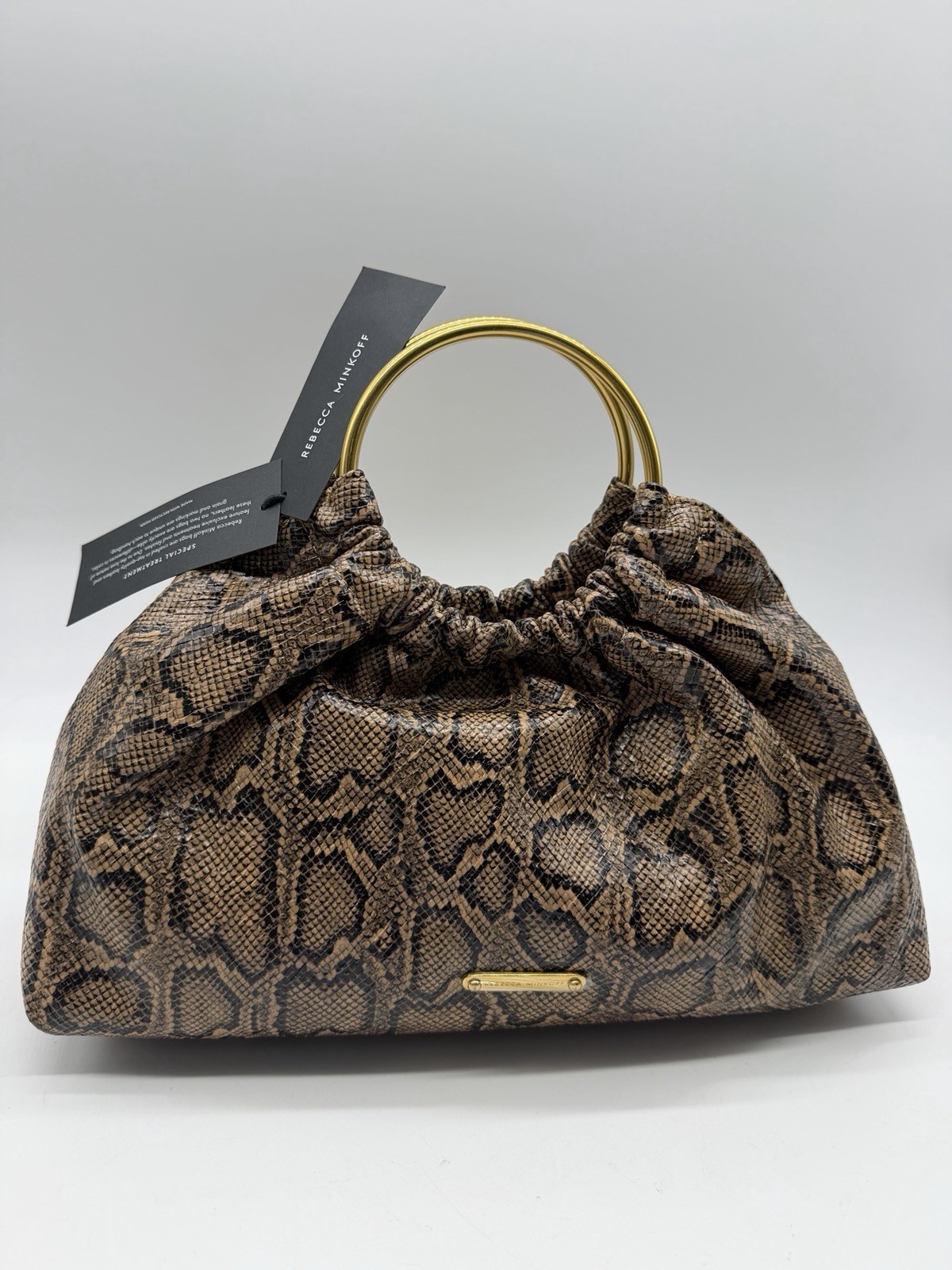 REBECCA MINKOFF Madeleine snake print round handle small satchel – Brown
