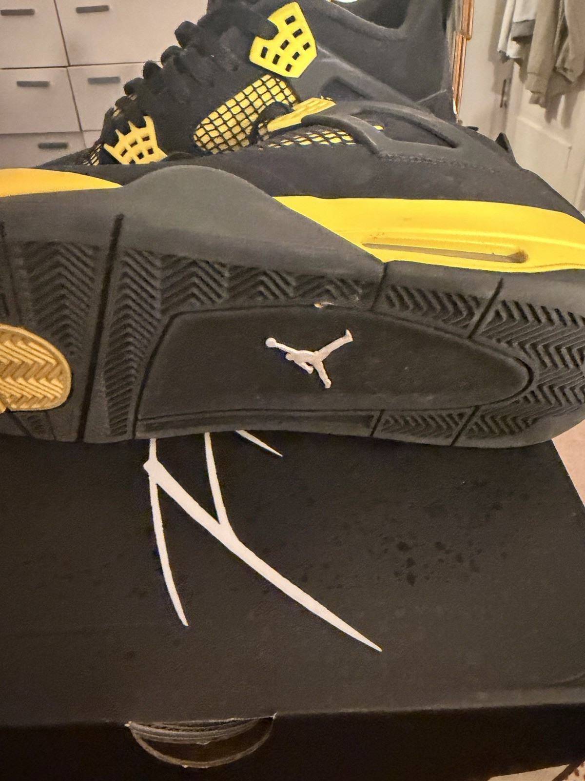 Jordan Air Jordan 4 Retro Thunder Black/Tour Yellow Mid Top Men’s Sneakers