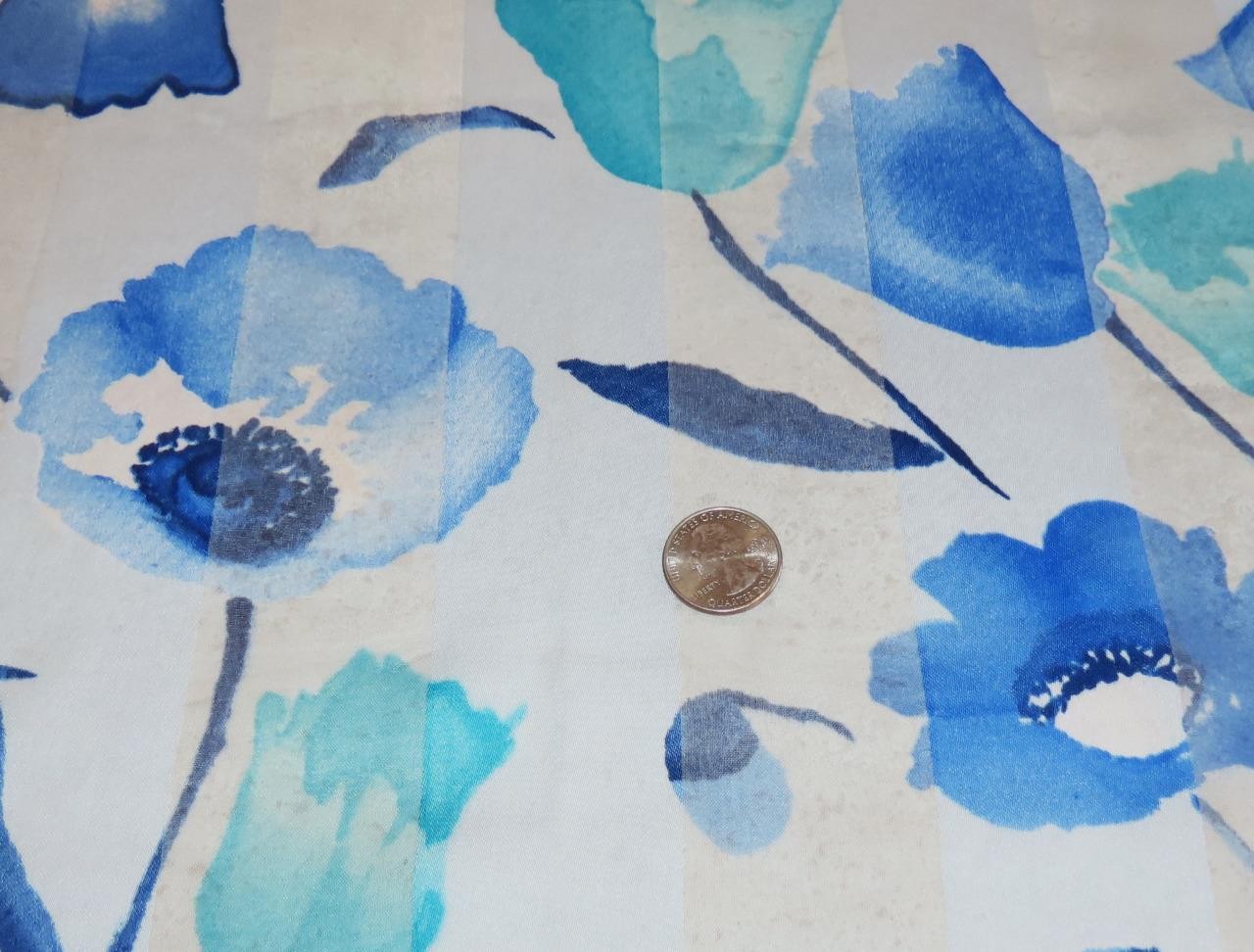 Oblong floral scarf; blue tones, white; 60×14.5 in. Semisheer; poly blend?