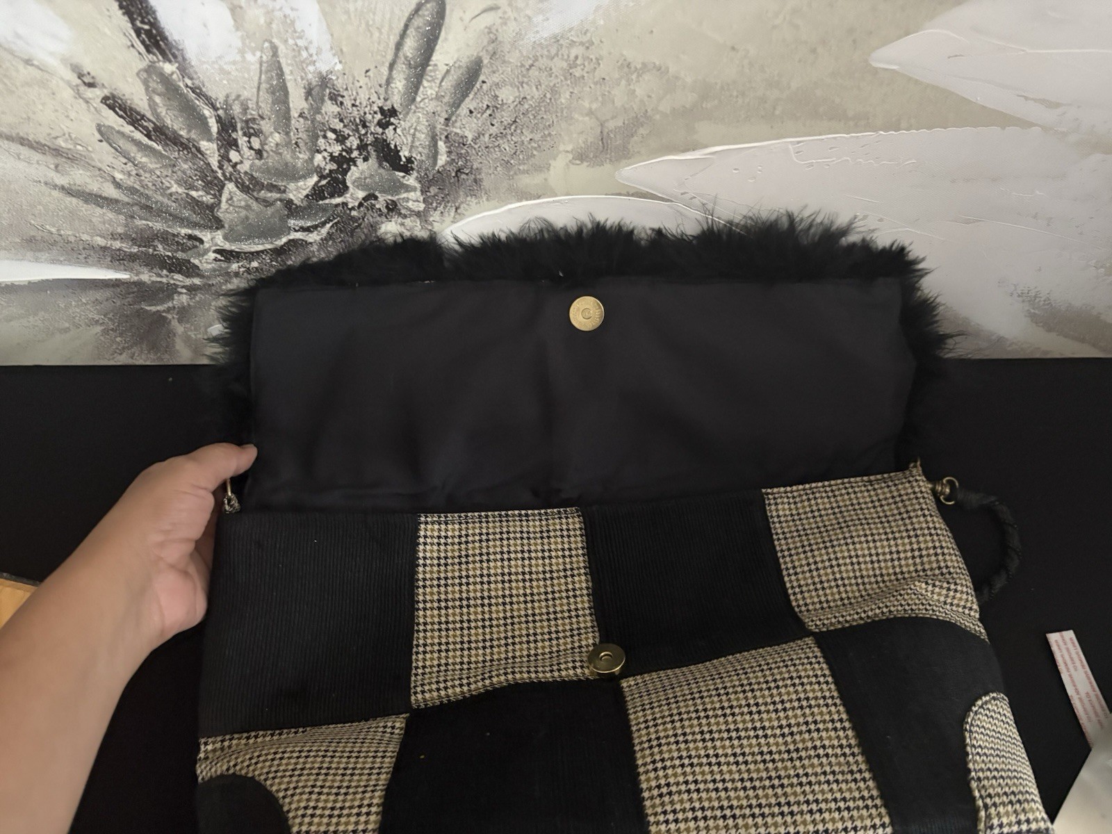 Elevate your style with this chic black and tan checkered women’s Handbag