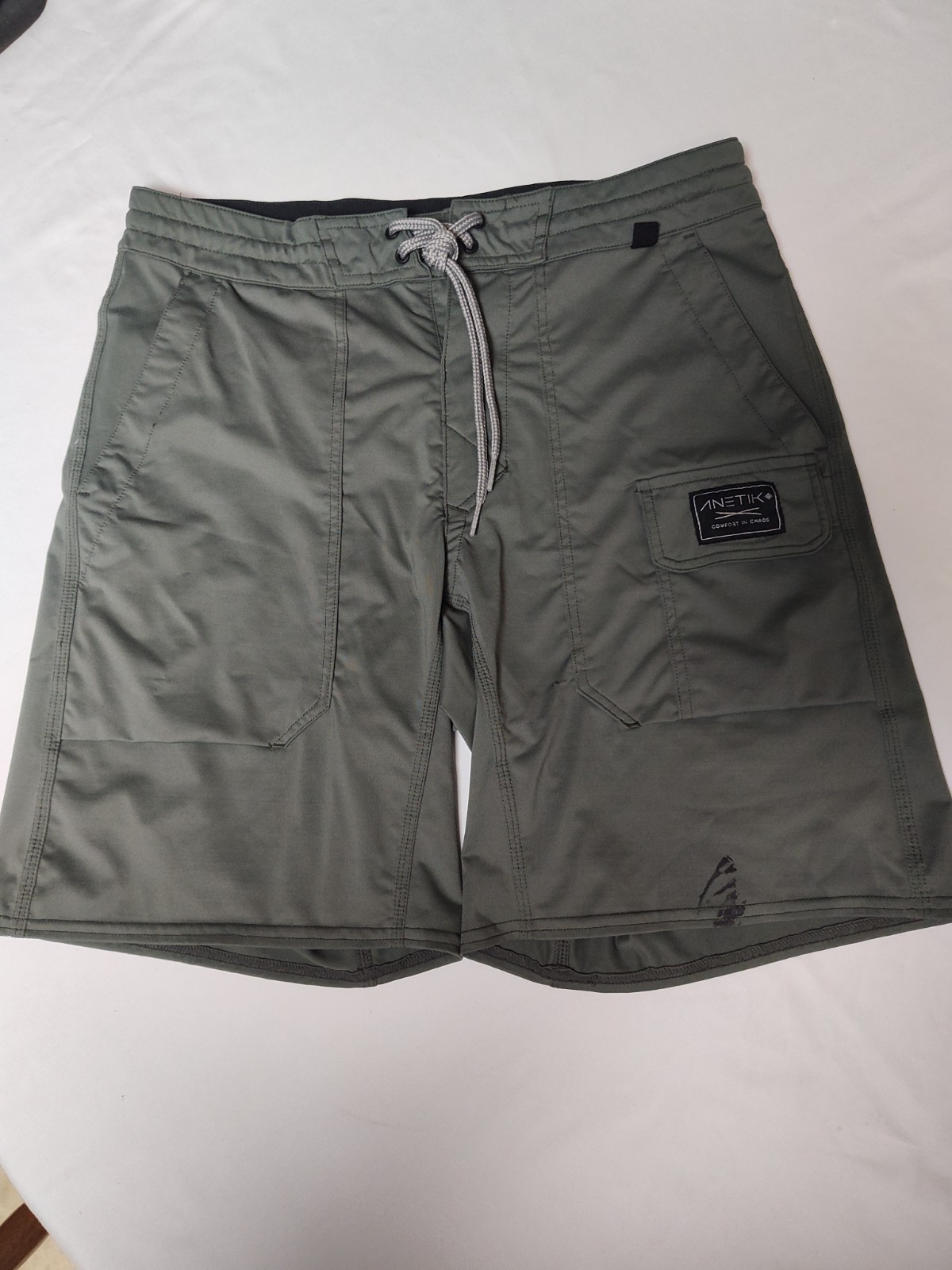 Anetik Men’s Roam Tech Shorts in a dark olive color Size Small