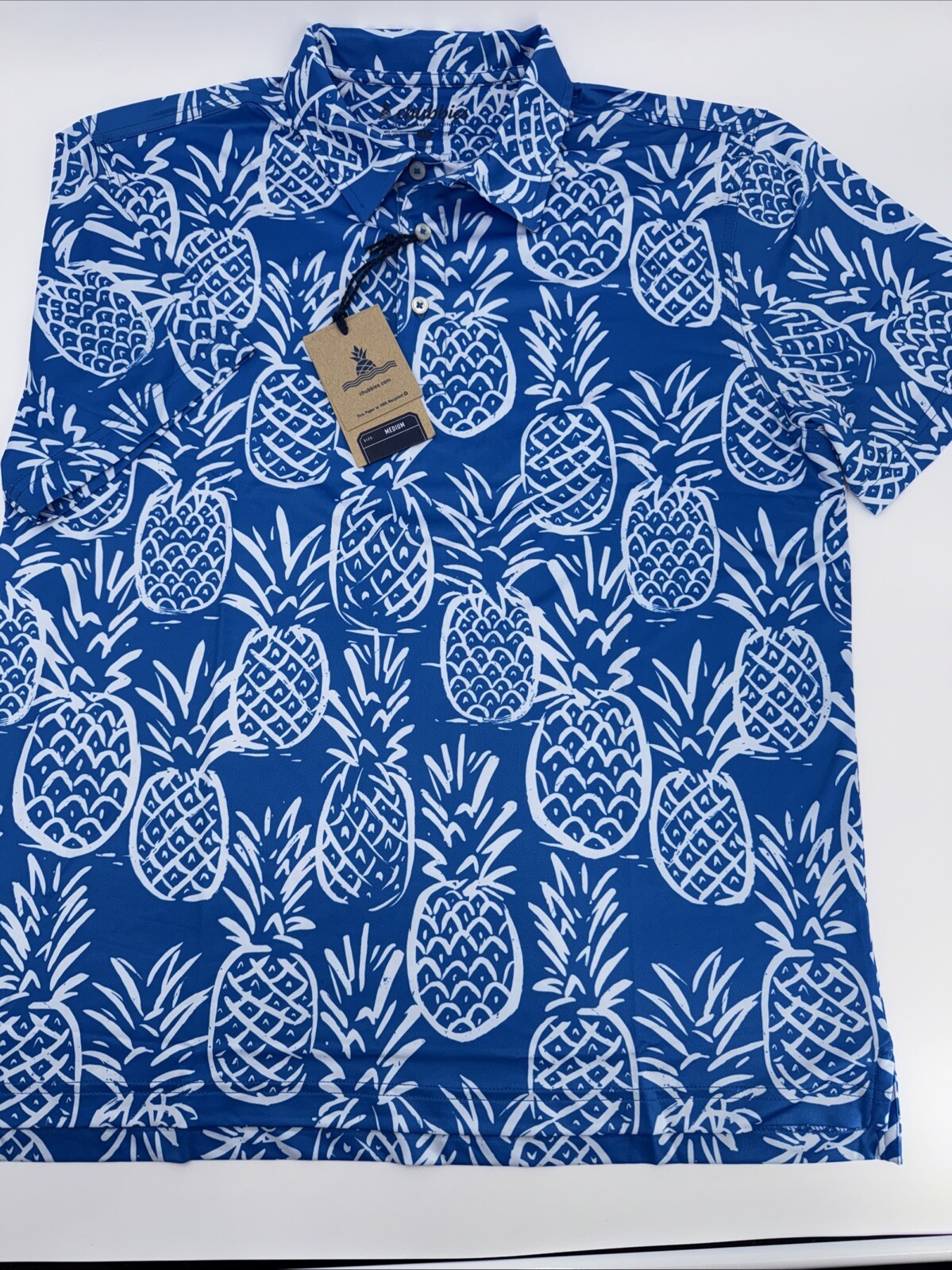 Chubbies Men’s The Thigh Napple Performance Polo Shirt-Blue Pineapple-Medium-New
