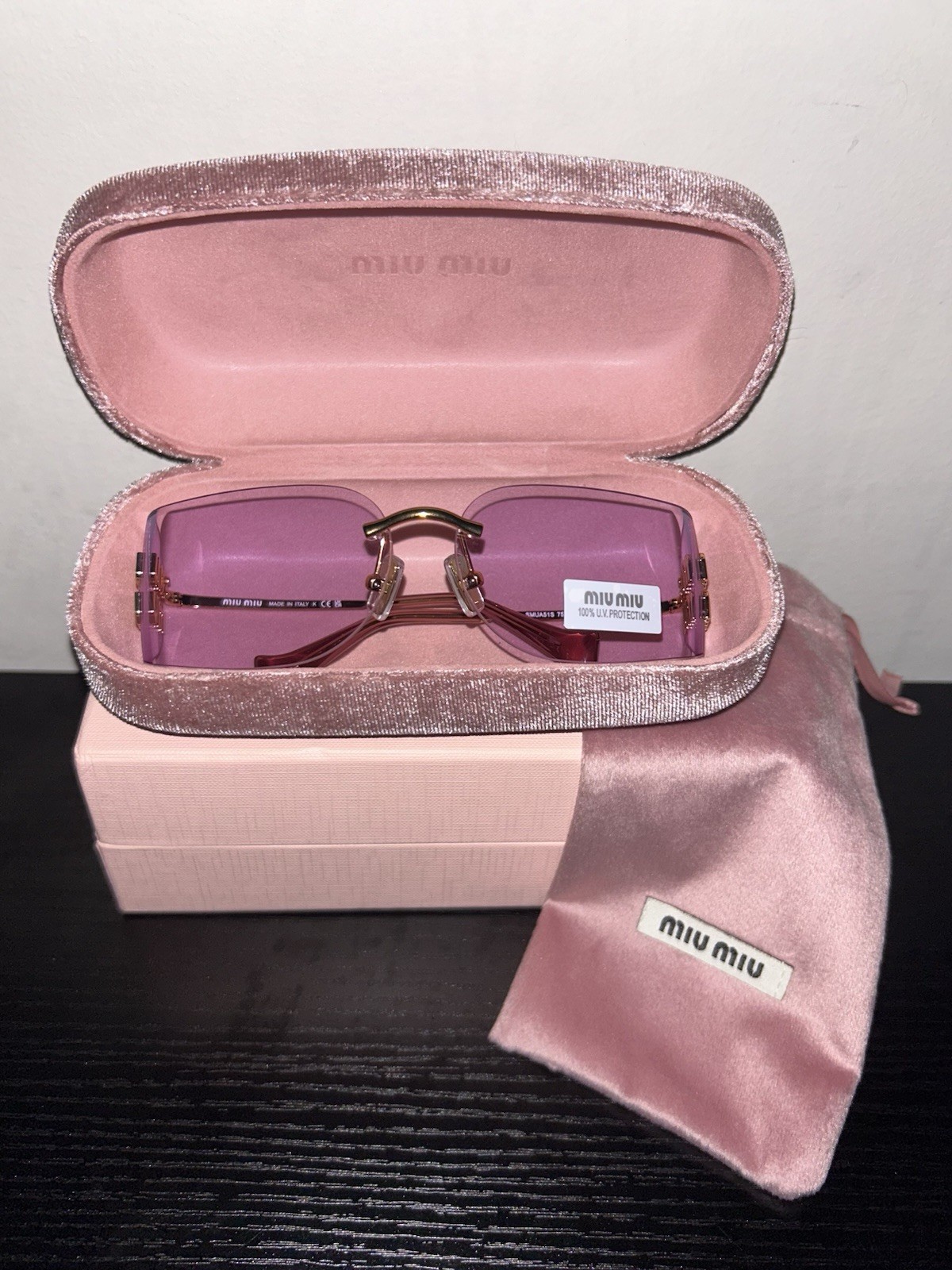 Miu Miu MU A51S Rimless Shield Sunglasses Pale Gold Frame Pink Purple Lens