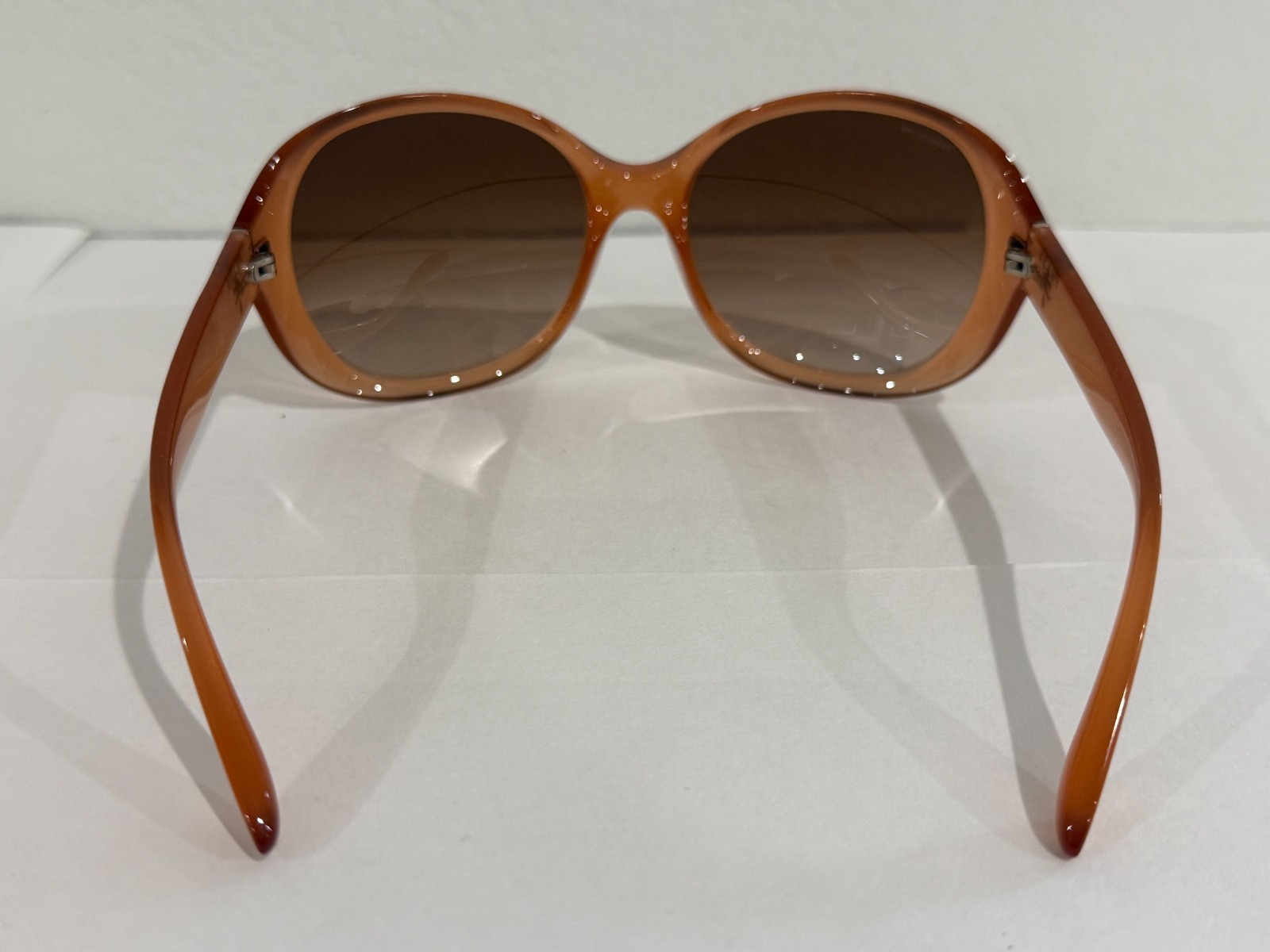 Prada Sunglasses SPR 04O semi-traslucent frame oversized rounded rims