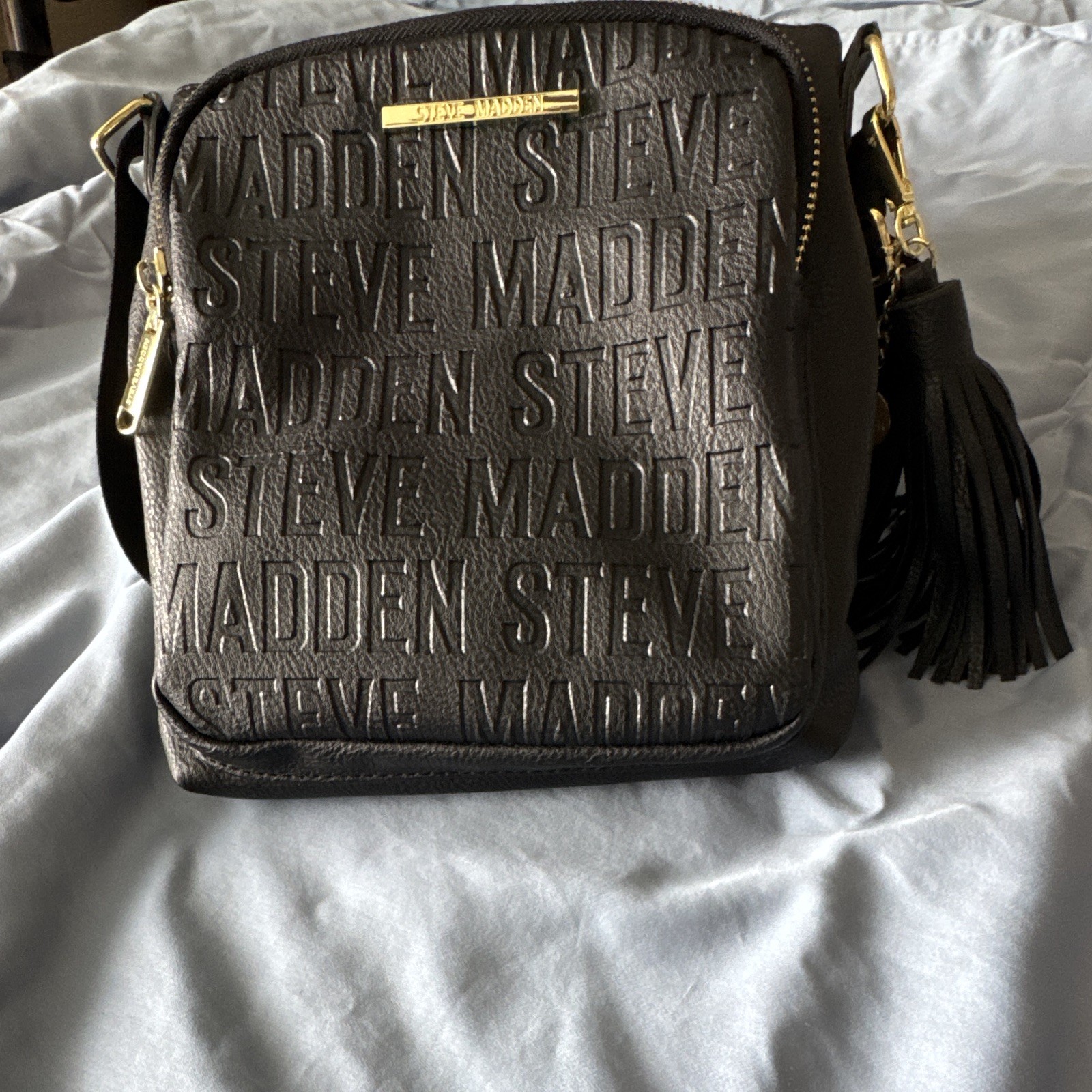 Steve Madden Black Logo Crossbody Bag Tassel Gold Hardware Zip Detachable Strap