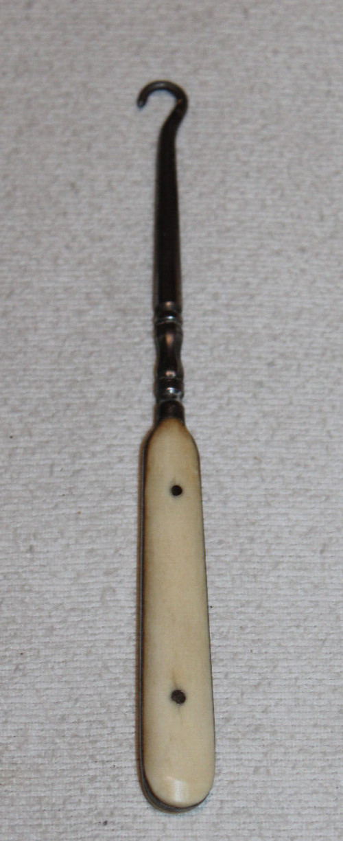 vintage 6 1/4″ shoe or glove button hook with bone handle 2 pins