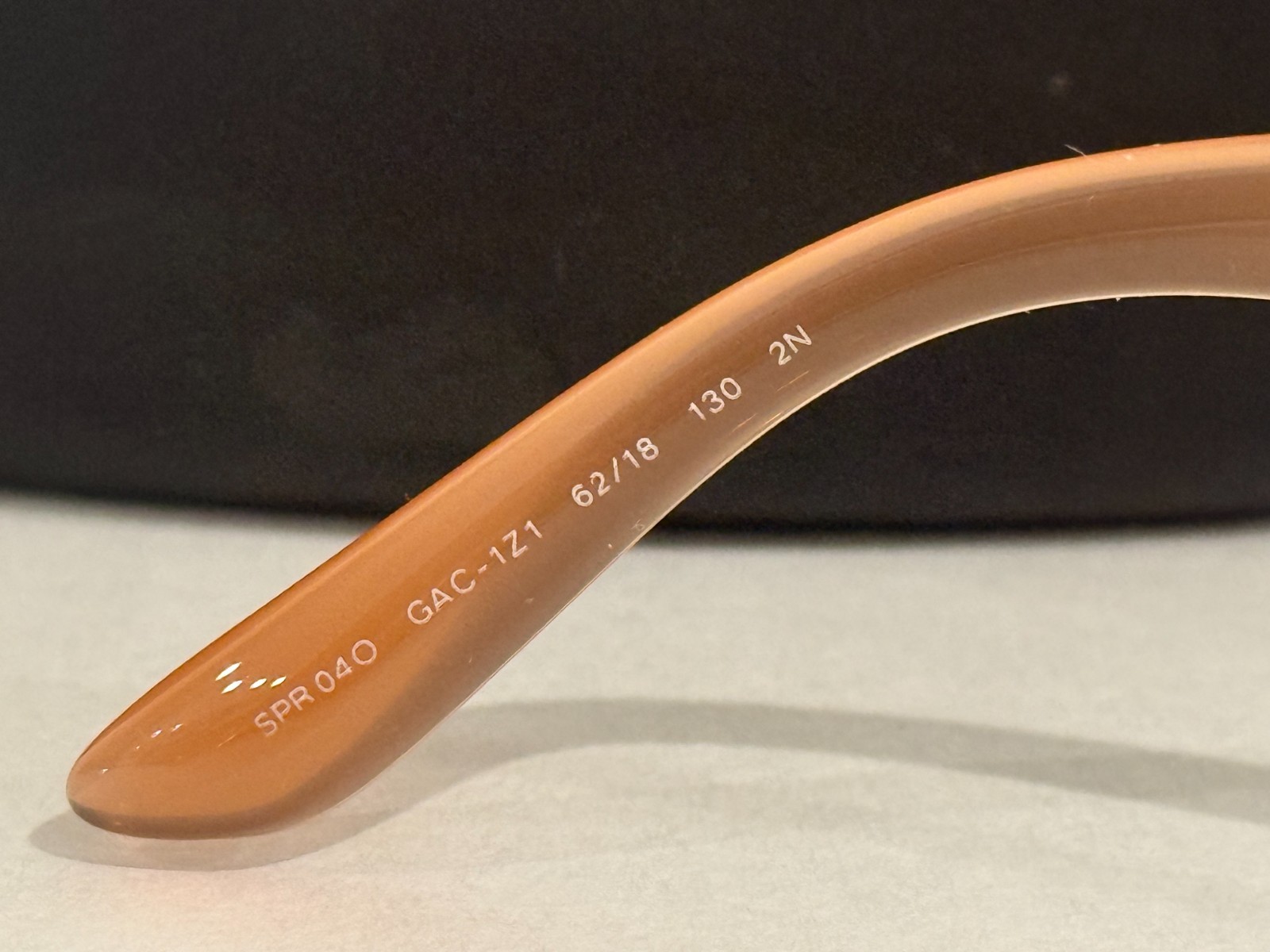 Prada Sunglasses SPR 04O semi-traslucent frame oversized rounded rims