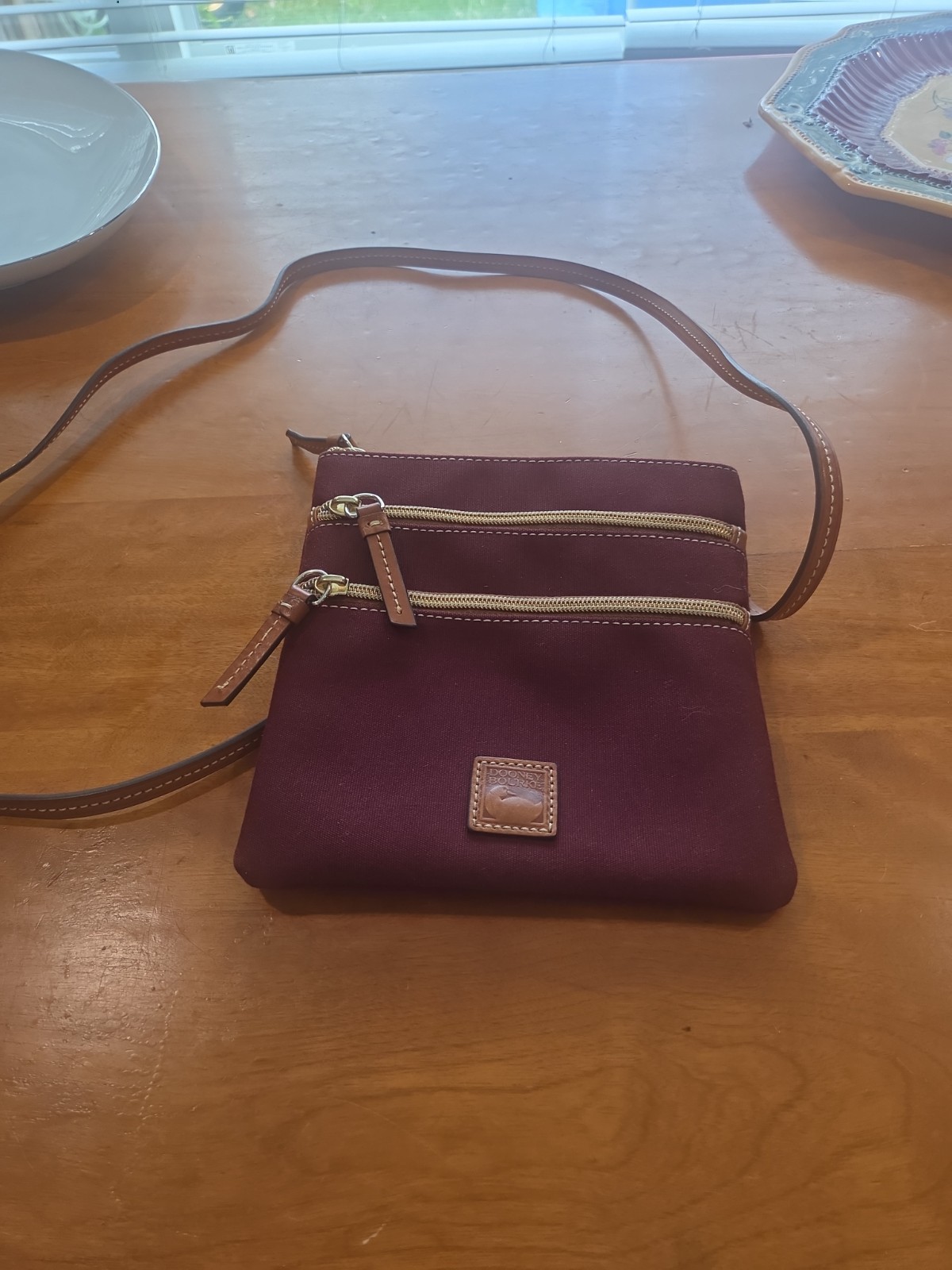 Dooney Bourke Women’s Burgundy Gold Adjustable Strap Crossbody Bag