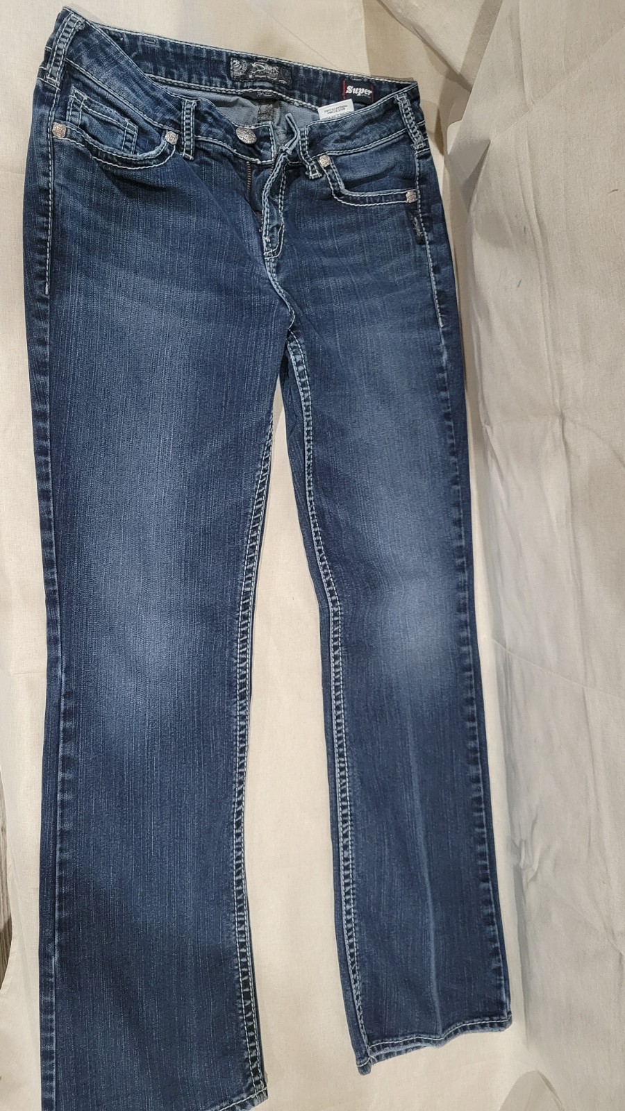 Silver Jeans Co. Women’s Suki High Rise Slim Bootcut Medium Wash Stretch Blue