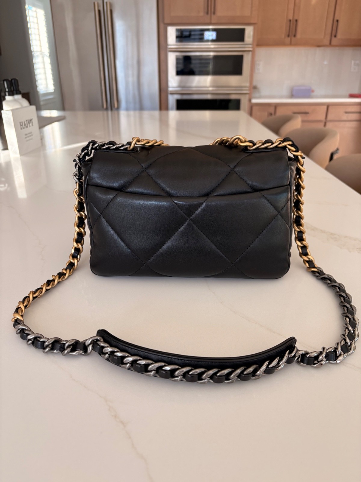 Authentic Chanel 19 in black Lambskin with mixed hardware size small