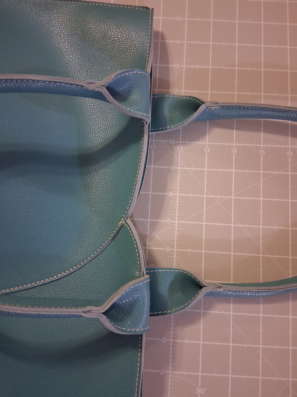 Mellow World tote grained vegan leather tulip curved front panel vibrant teal