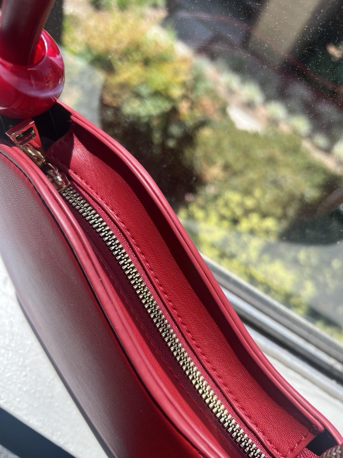Melie Bianco Red Crescent Top Handle Bag Solid Gold Hardware Zip Closure Cross