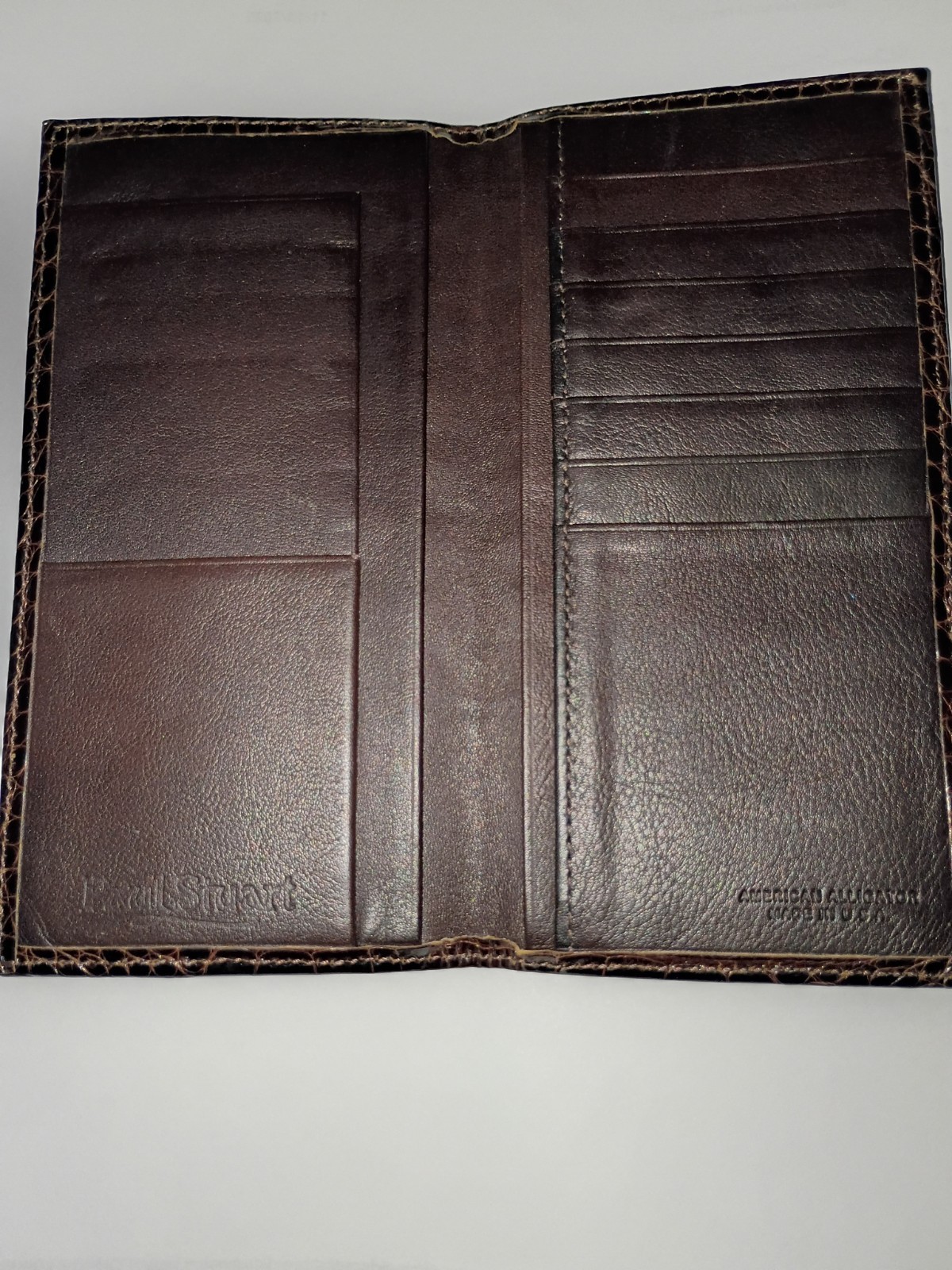 Elevate your collection with this brown glazed authentic alligator long wallet