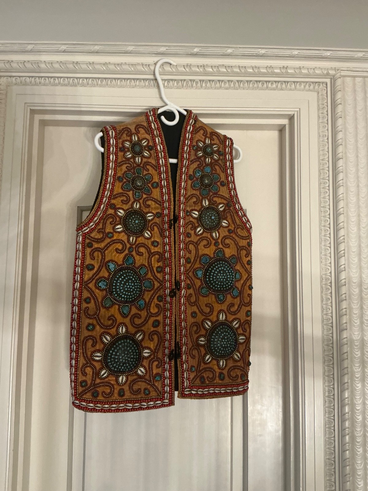 Ornate Tibetan Dignitary Vest with coral and cowrie shells 19th century