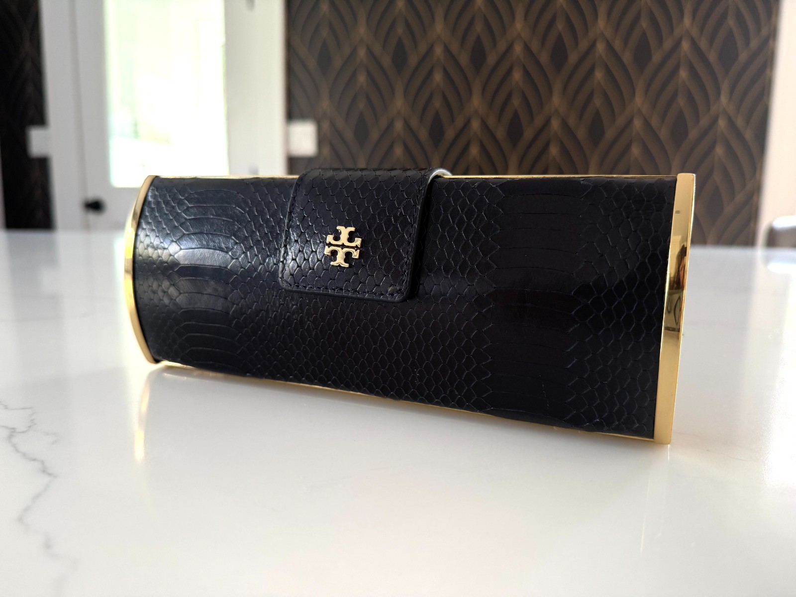 Tory Burch Embossed Black Leather Hard Shell Clutch with Gold Trim and Gold Logo