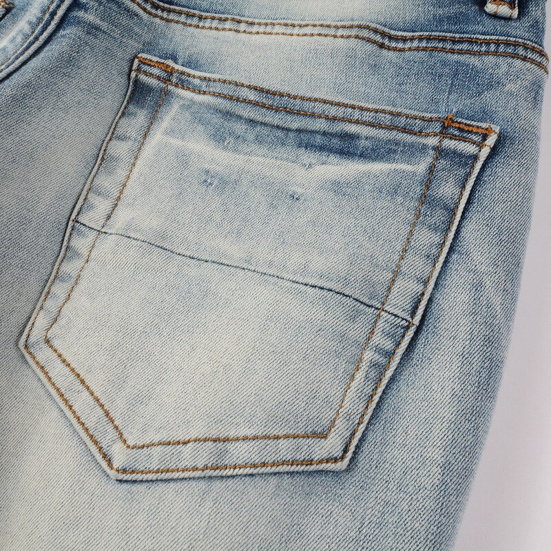 Men’s Slim Fit Stretch Denim Jeans with Paisley Patch Detail & Distressed Wash