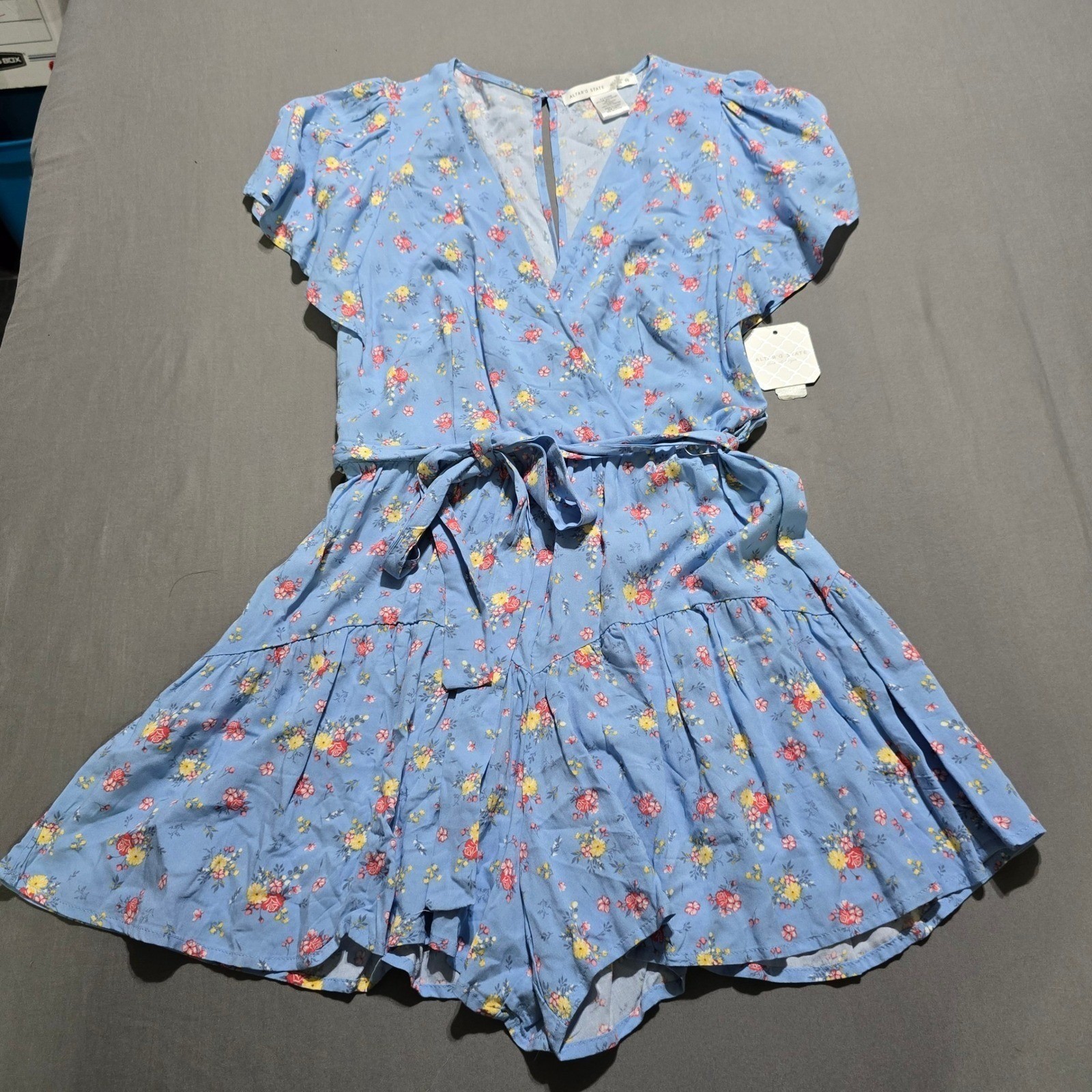 new Altar’d State Floral Romper Women Medium Blue V-Neck Ruffle