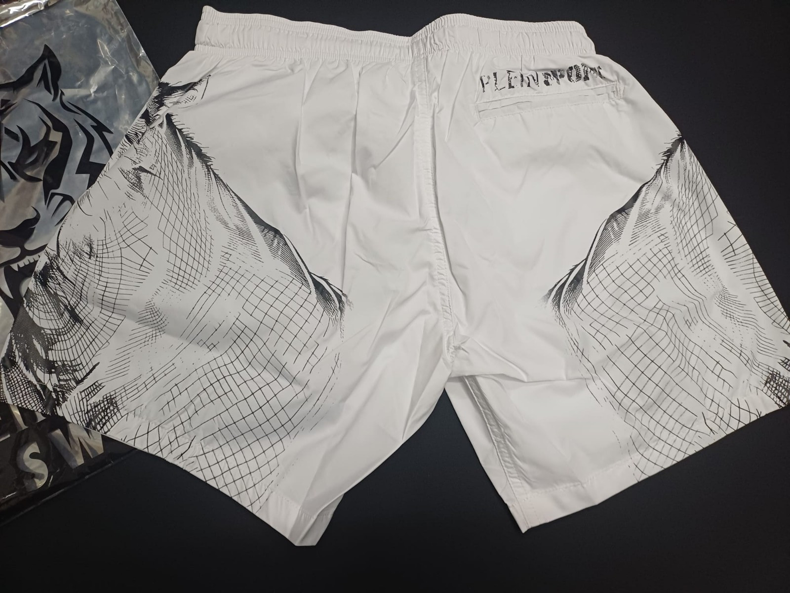 PHILIPP PLEIN SPORT MEN’S MEDIUM BOARDSHORT TIGER PRINT WITH THE BRAND LOGO .
