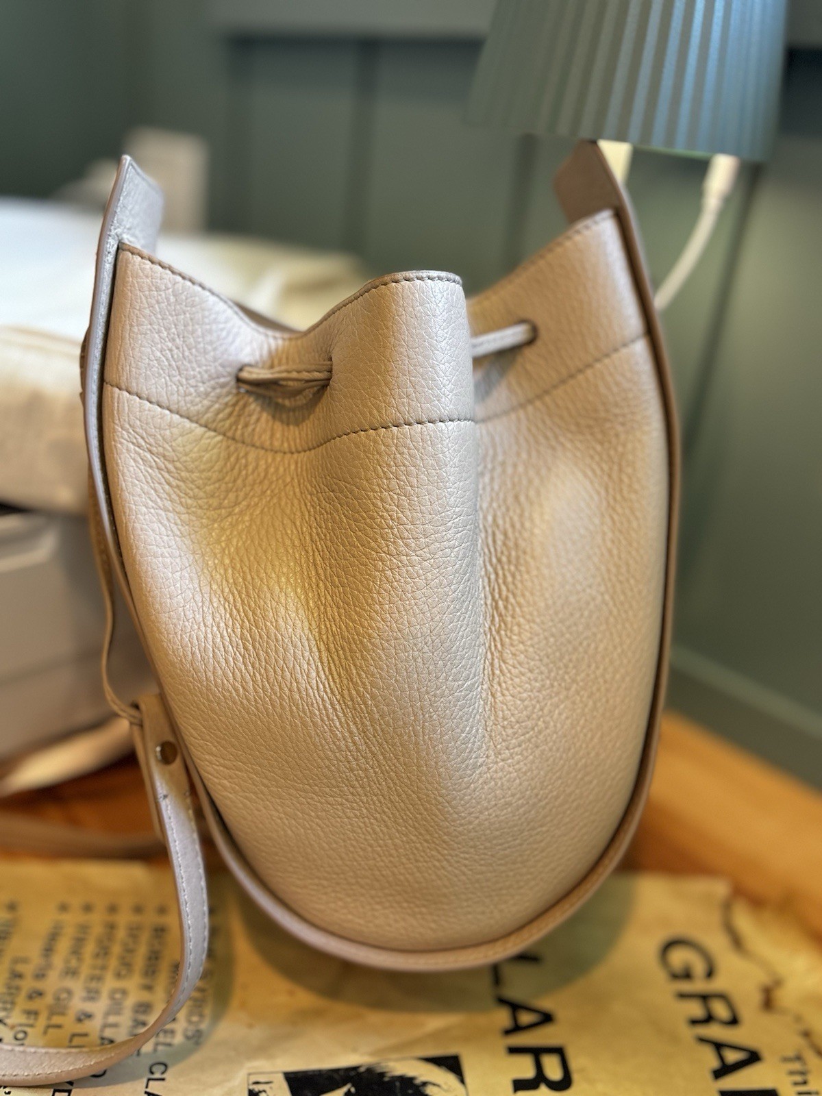 THE ROW Beige Pebbled Drawstring Bucket Crossbody Bag Gold Hardware
